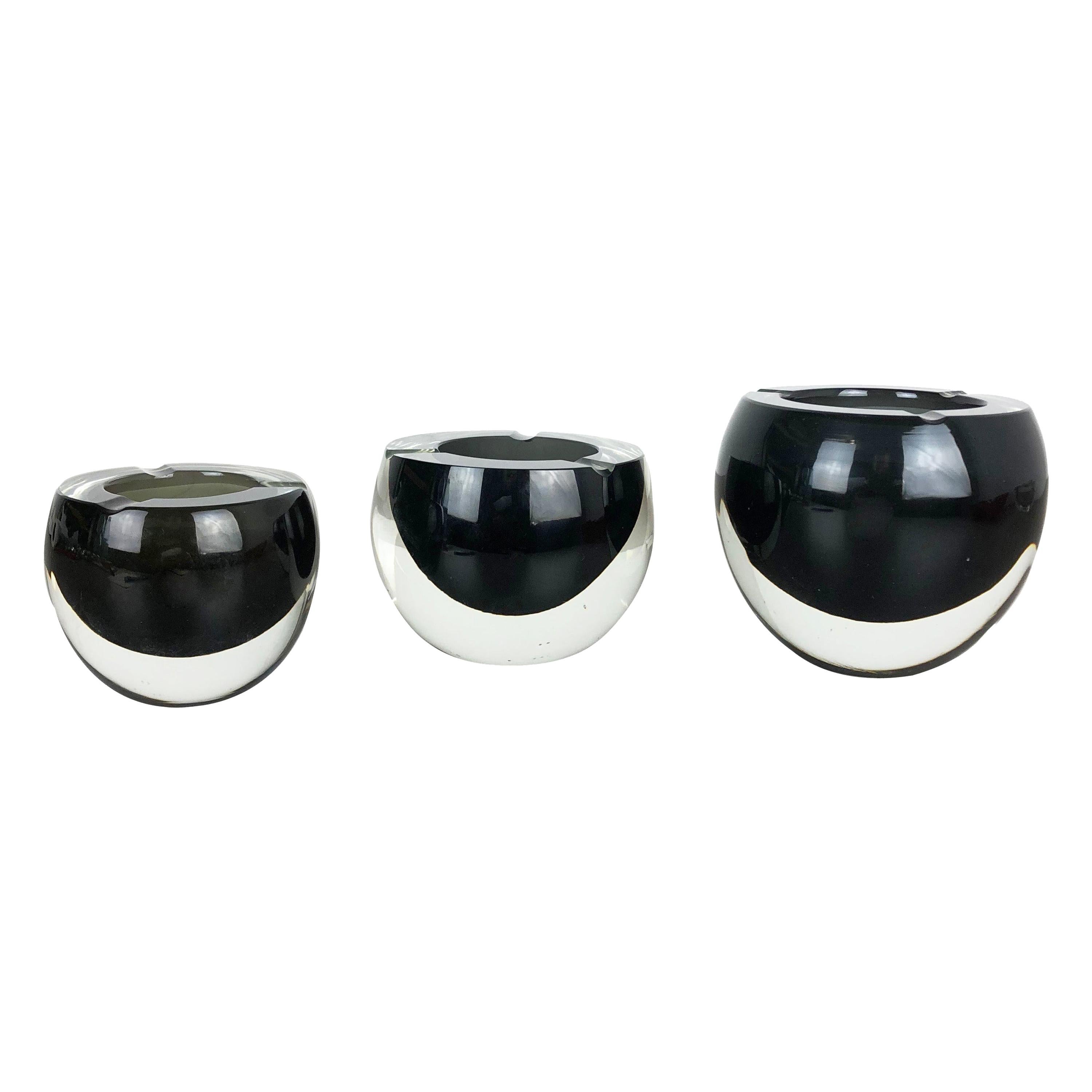 Article:

Murano glass ashtray bowl set of 3


Design:

Antonio da Ros


Producer:

Cenedese Vetri (marked underneath the bowl)


Origin:

Murano, Italy


Decade:

1960s-1970s


This original ashtray bowl set was produced in