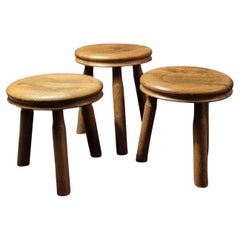 Set of 3 oak Charlotte Perriand style stools, France 1960s