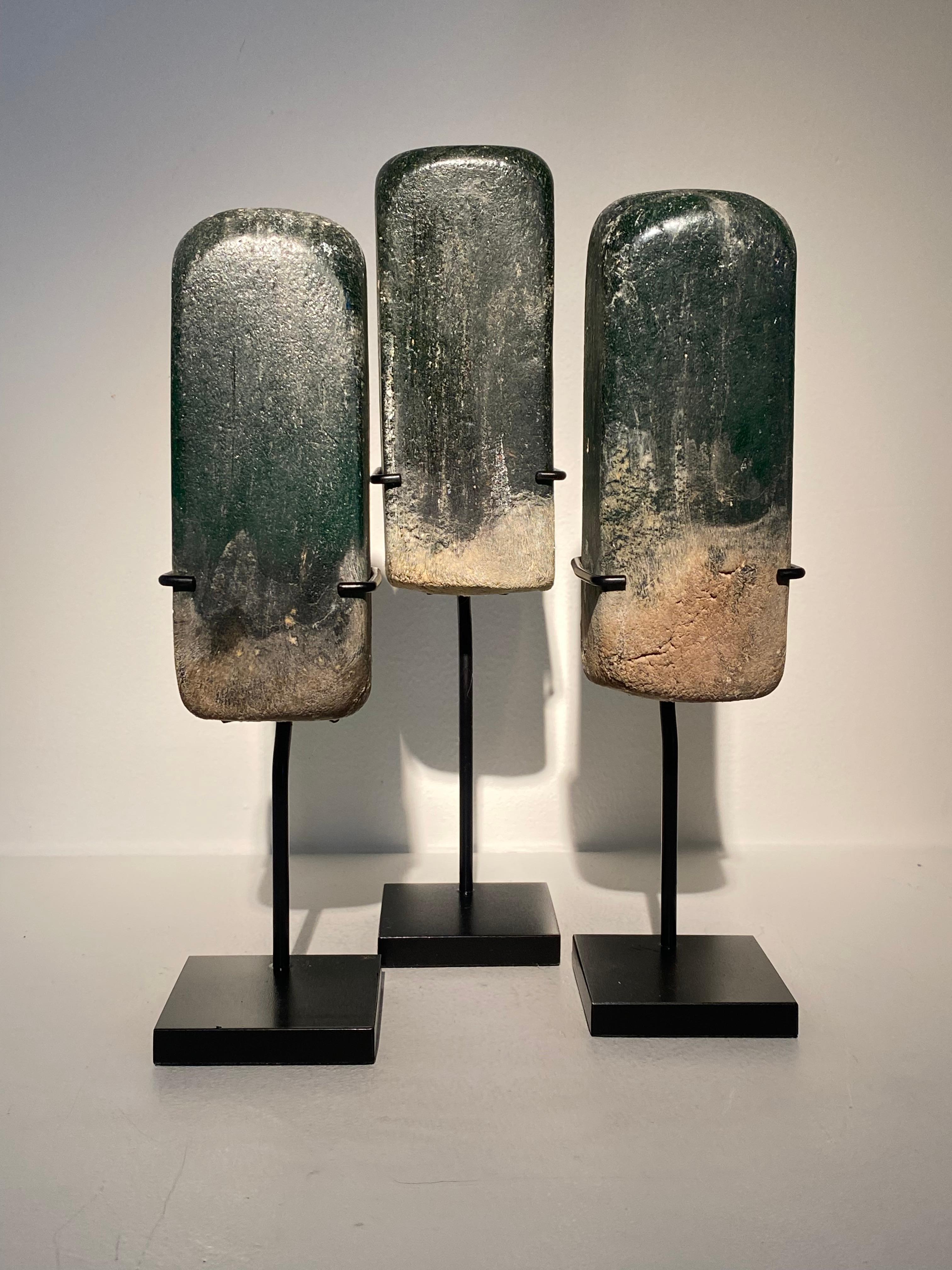 Exceptional set of 3 rectangular objects made out of Glass,
from the Thailand region in South-East-Asia,
these objects made out of Green Glass were used in the handmade production of Jewelry,very decorative items,
mounted on a metal stand in