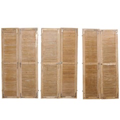 Set of Three Pairs of French 19th Century Natural Wood Shuttered Doors