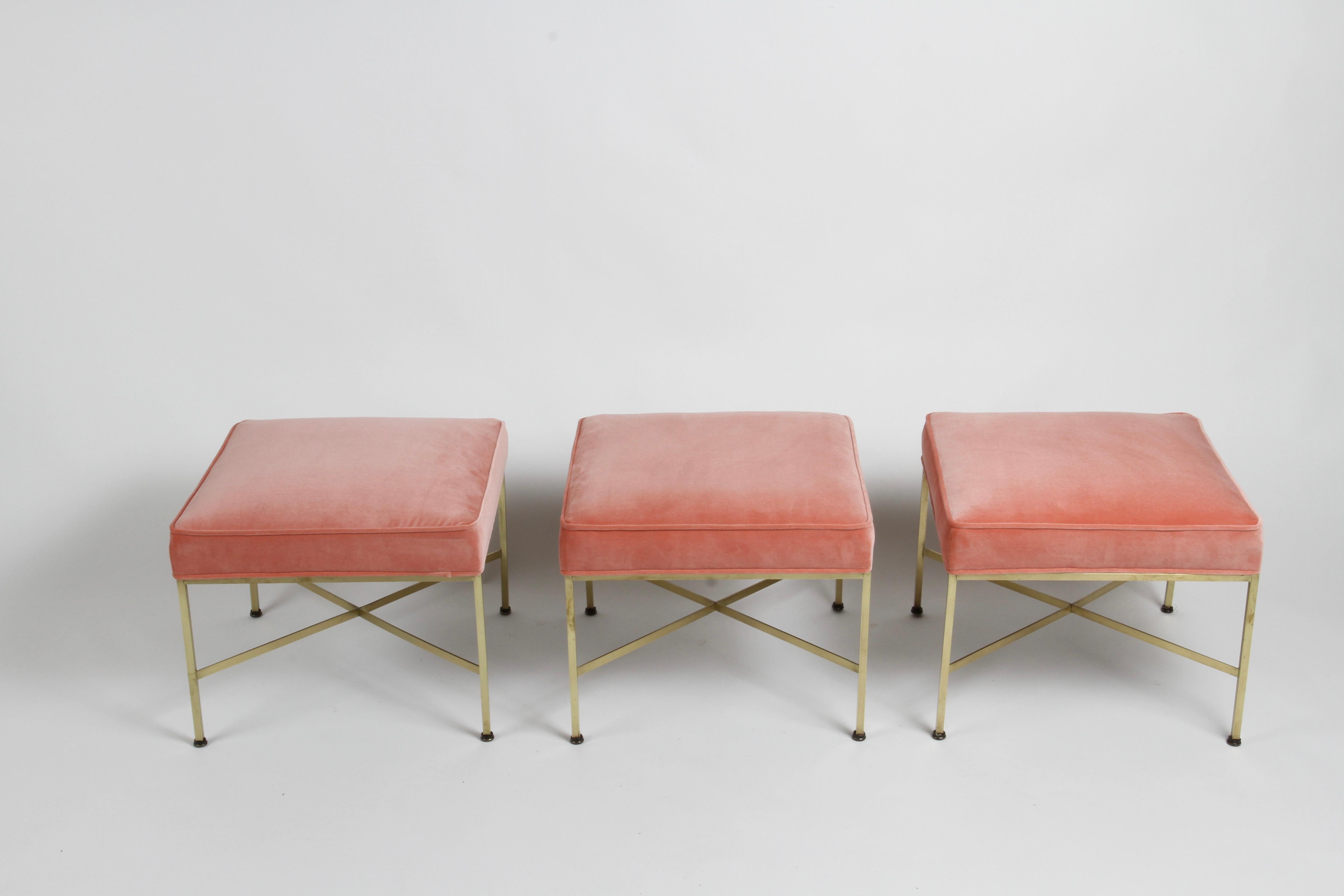 Set of 3 fully restored Mid-Century Modern Paul McCobb model 1306 for Directional brass X base ottomans or stools , reupholstered in Holly Hunt Salmon colored velvet. Brass has been polished, unlacquered. New foam and original glides. No lablels. 