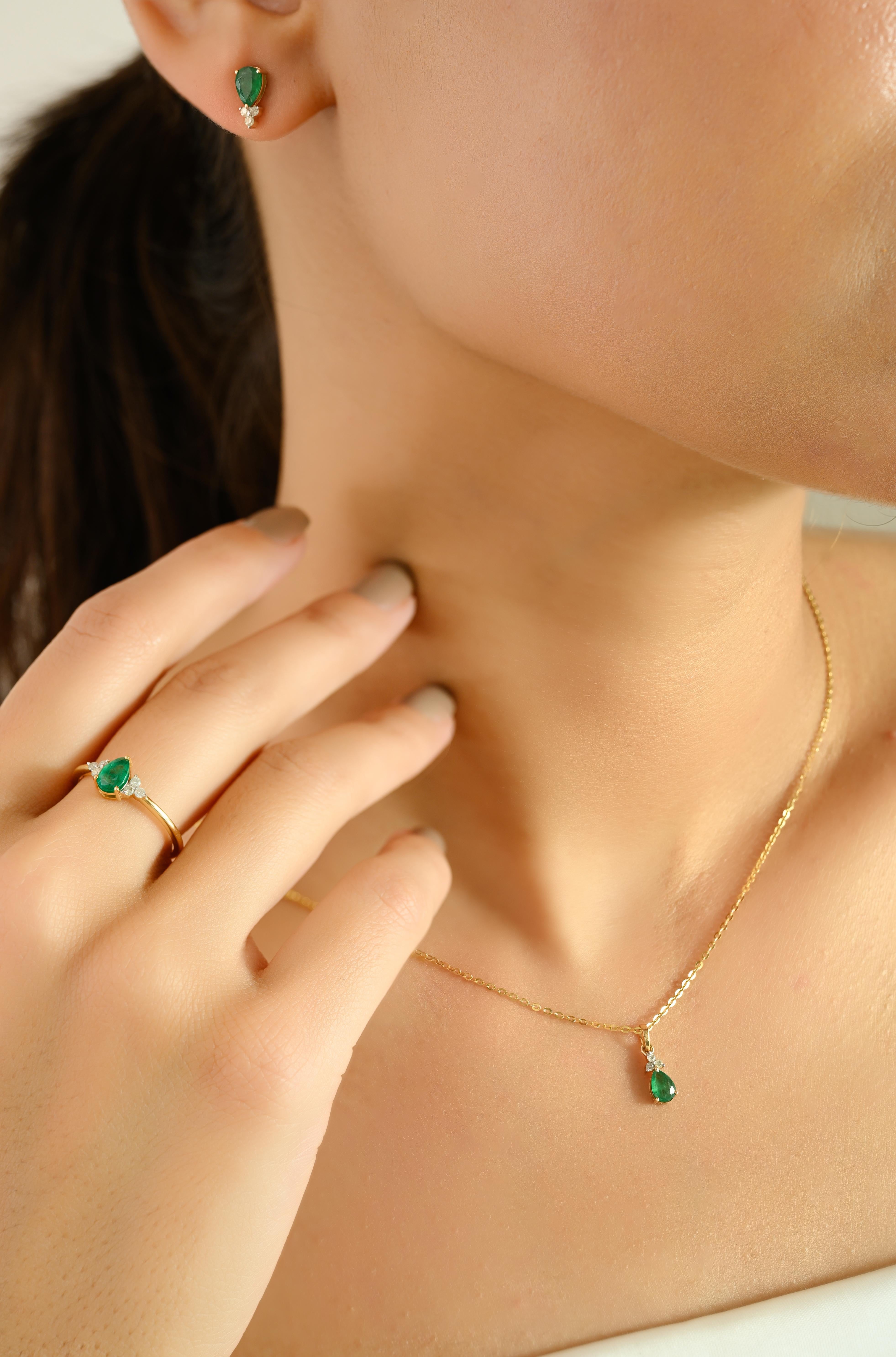 Elevate your elegance with this exquisite 3-piece jewelry set, meticulously handcrafted in 18k yellow gold. Featuring a stunning pear-cut emerald as the focal point, each piece in the set — including a delicate ring, elegant stud earrings, and a