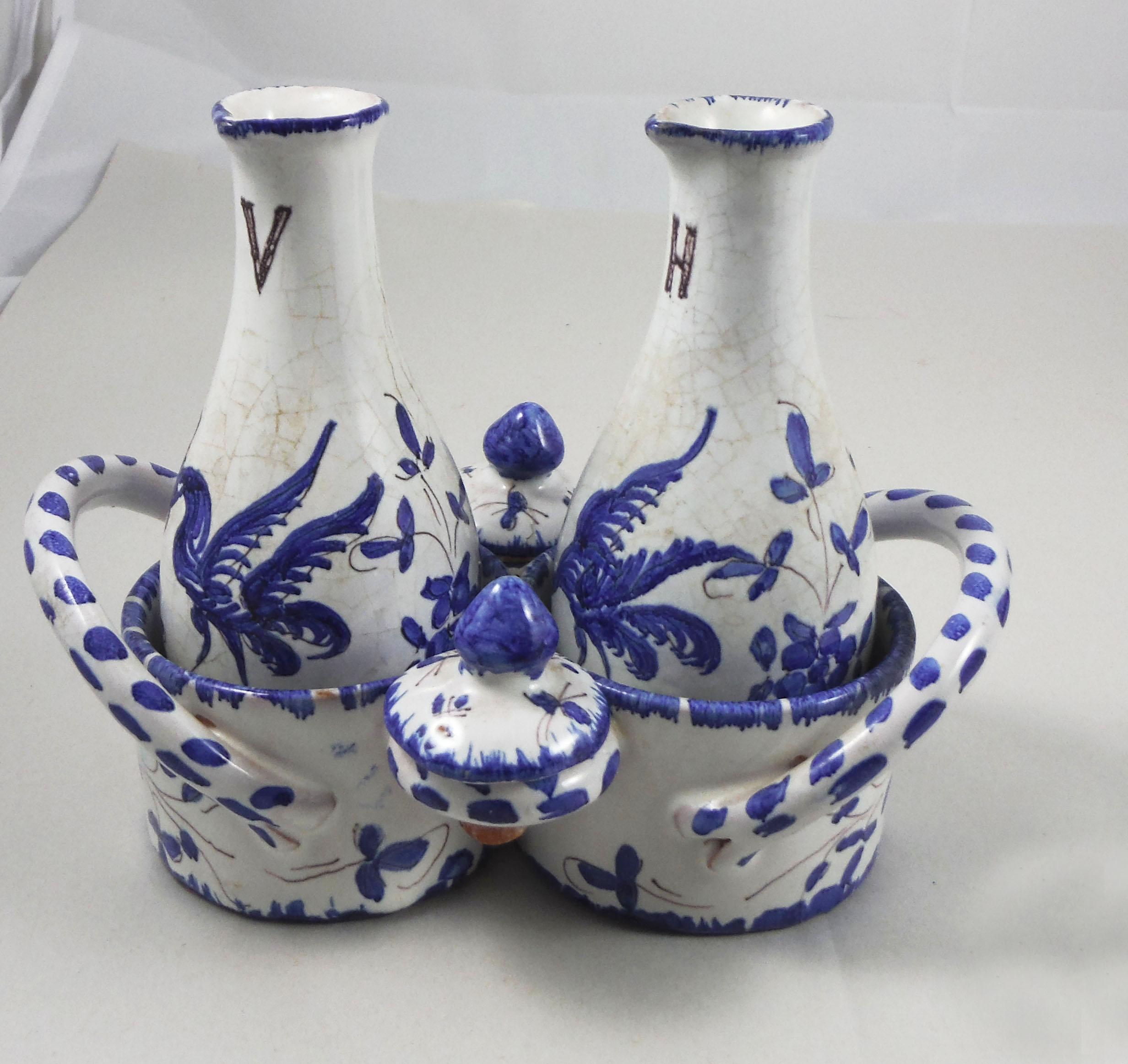 French blue-and-white faience oil and vinegar cruet set.
In the taste of Moustiers.