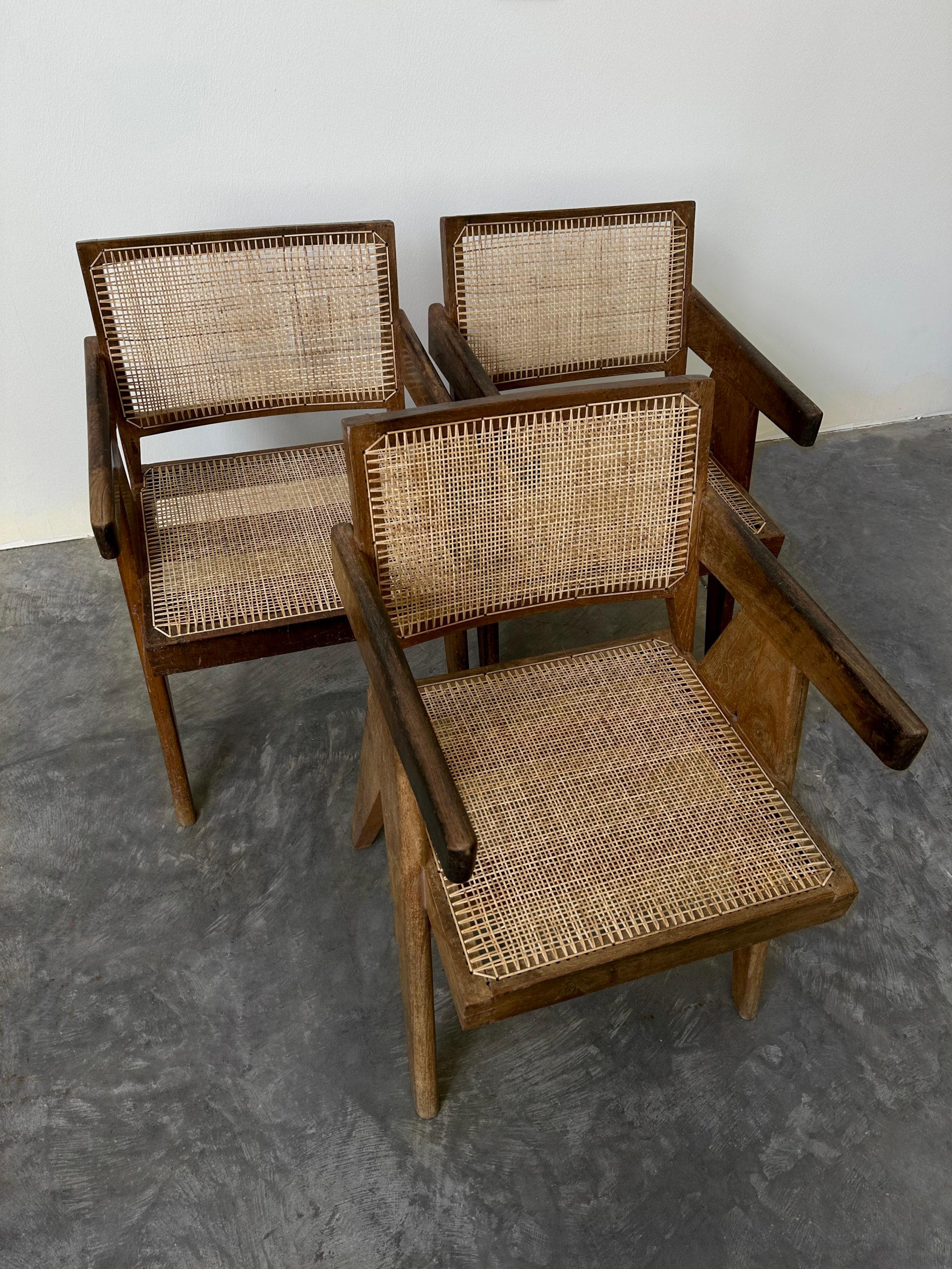 This set of 3 office chairs were used throughout the decades in various administrative buildings in Chandigarh, India. The markings on the back indicate their last designated use and can be removed if requested. Small chips and scratches can be