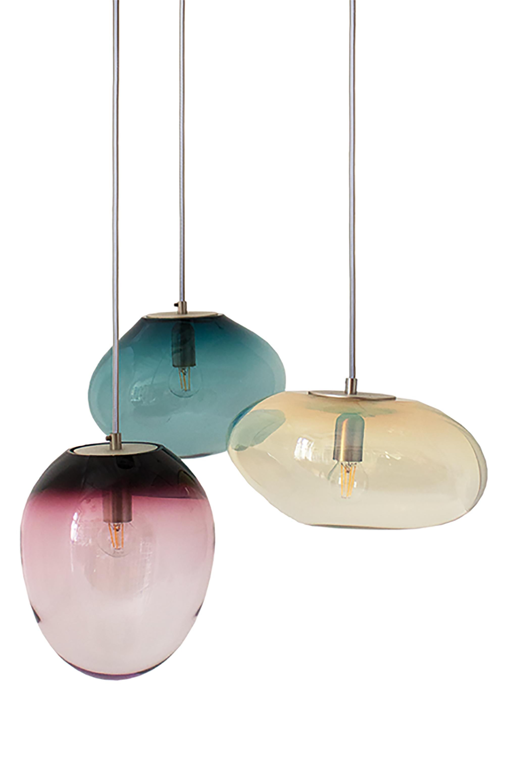 Set of 3 Planetoide pendants by ELOA
No UL listed 
Material: glass, steel, silver, LED bulb
Dimensions: D30 x W30 x H250 cm
Also available in different colours and dimensions.

All our lamps can be wired according to each country. If sold to the USA