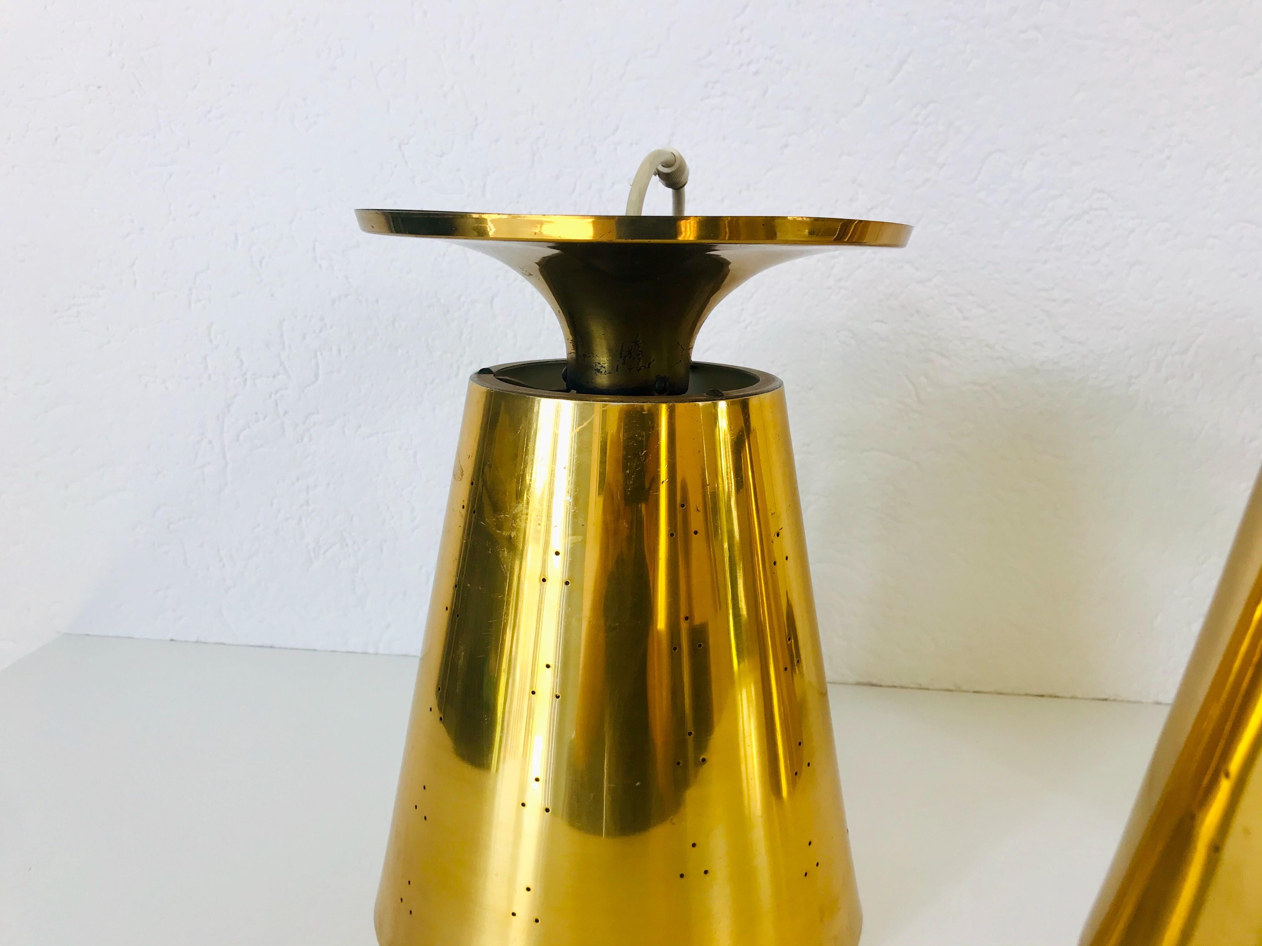 Set of 3 Polished Brass Pendant Lamps Attributed to Paavo Tynell, 1950s For Sale 4