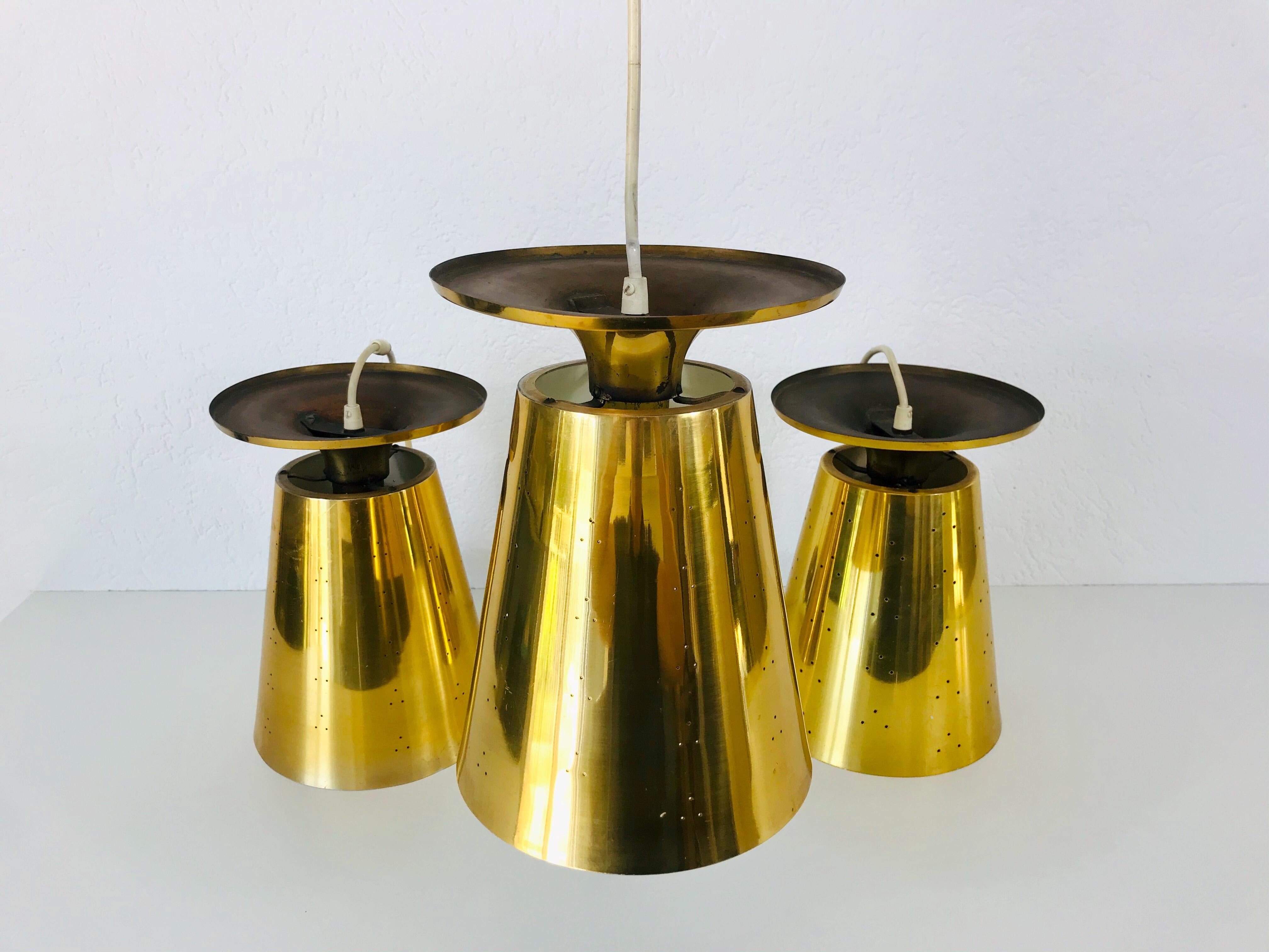 Set of 3 Polished Brass Pendant Lamps Attributed to Paavo Tynell, 1950s For Sale 6