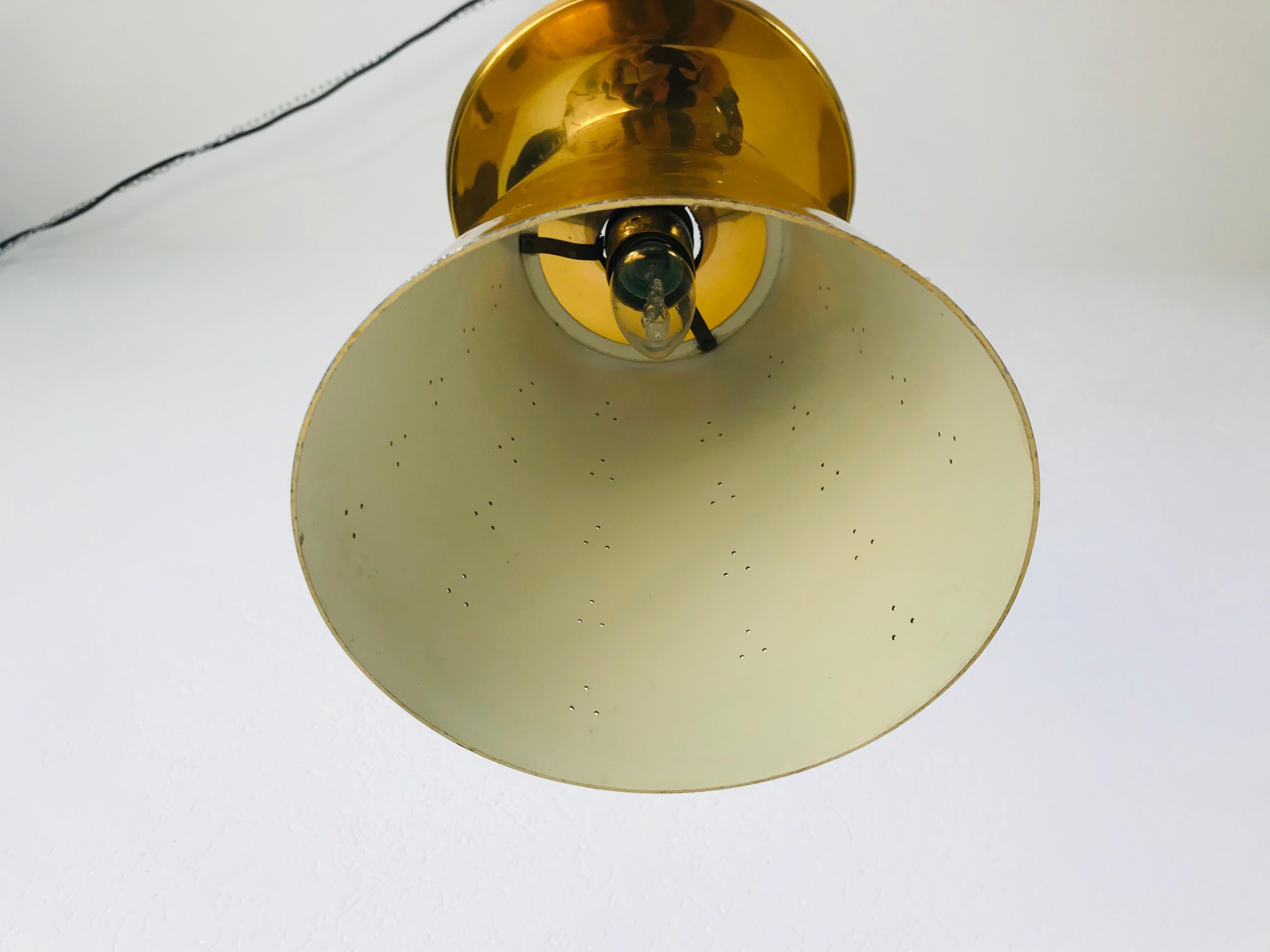 Set of 3 Polished Brass Pendant Lamps Attributed to Paavo Tynell, 1950s For Sale 9