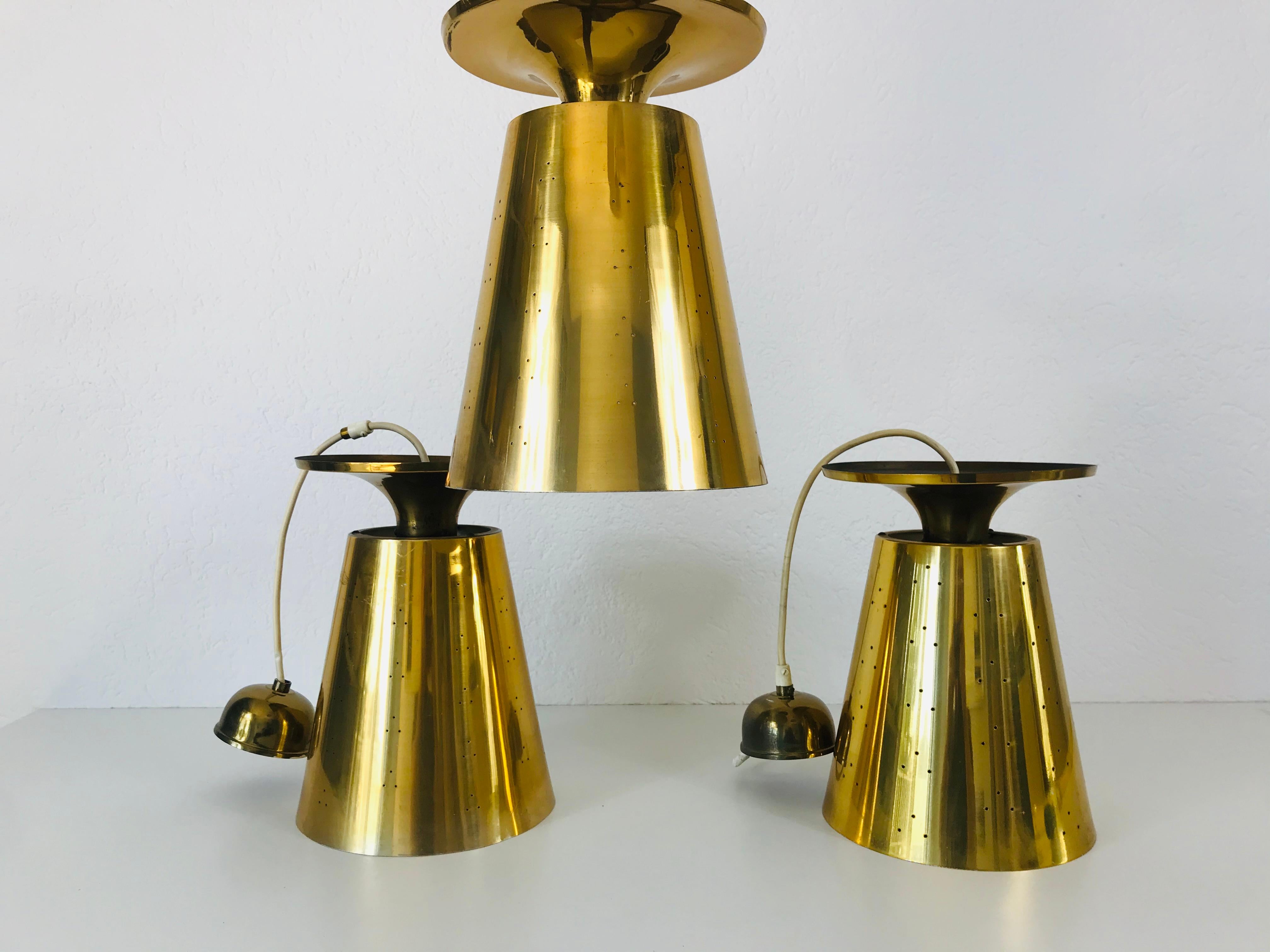 Set of 3 Polished Brass Pendant Lamps Attributed to Paavo Tynell, 1950s For Sale 10