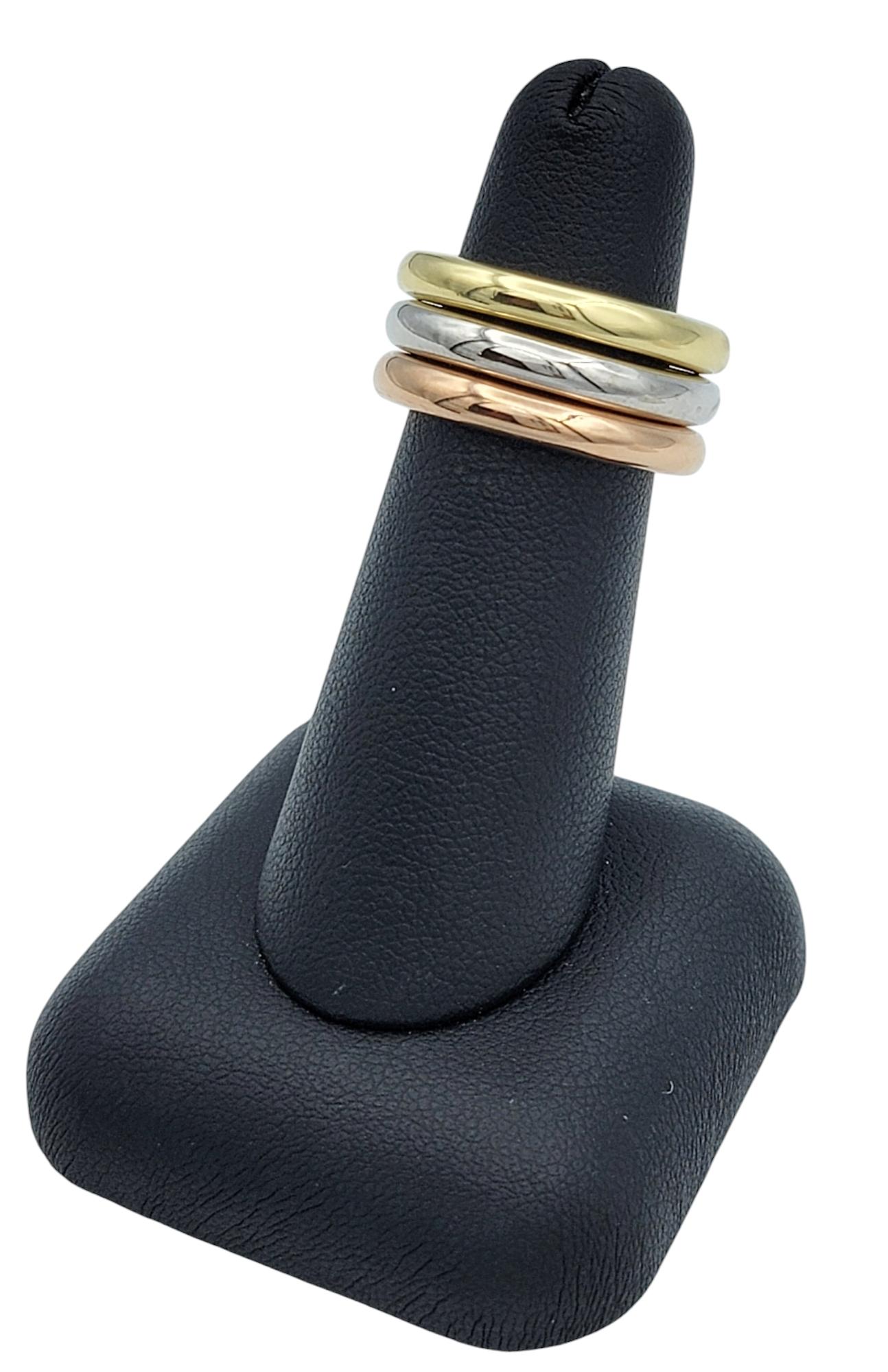 Set of 3 Polished Stacking Band Rings in 18 Karat White, Rose and Yellow Gold For Sale 2