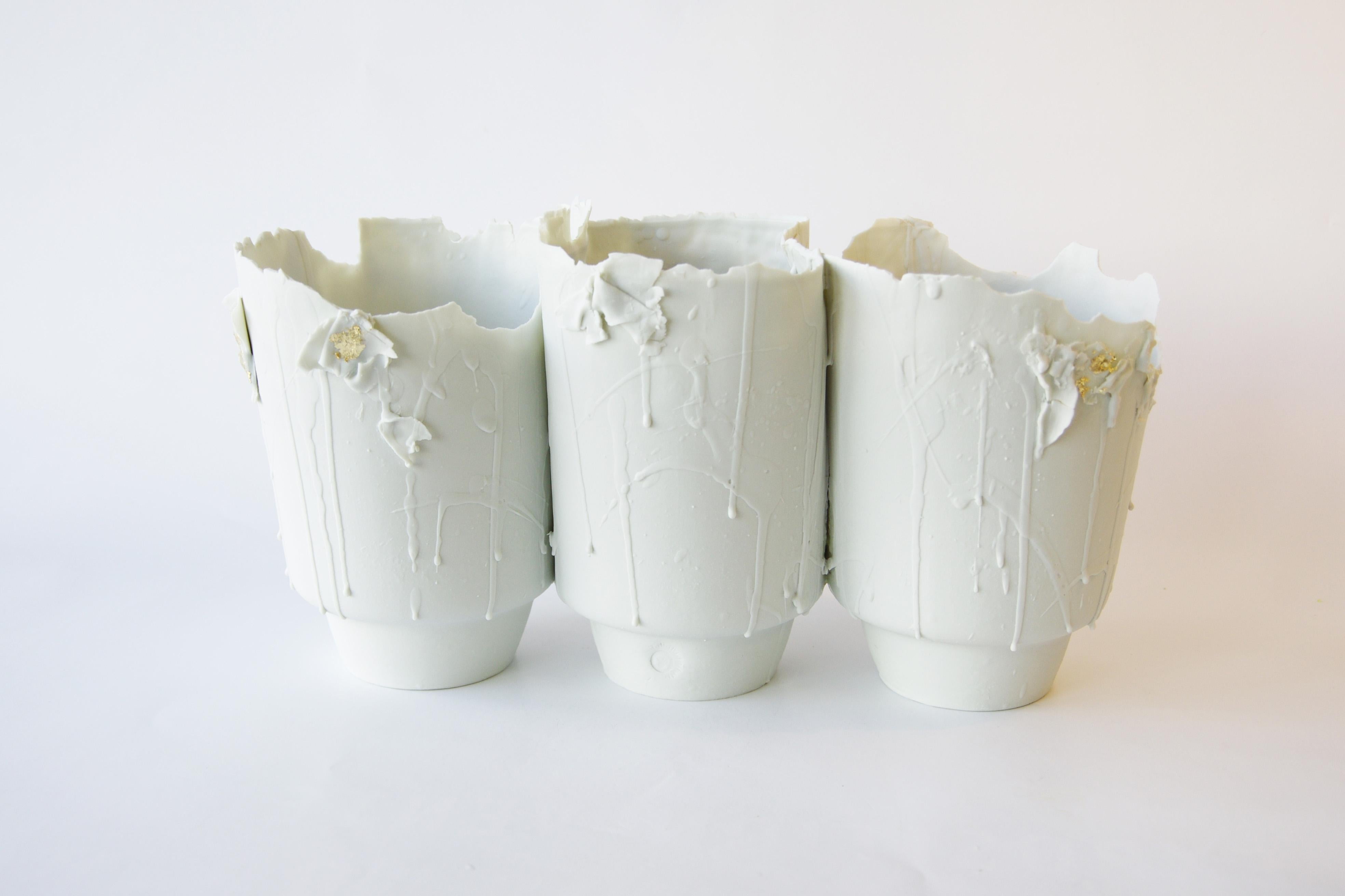 Set of 3 Porcelain Big Vases Imperfections by Dora Stanczel
One of a Kind.
Dimensions: D 13 x W 13 x H 16 cm (each).
Materials: Porcelain and gold.

I create bespoke and luxurious porcelain pieces with a careful aesthetic. Beyond the technical