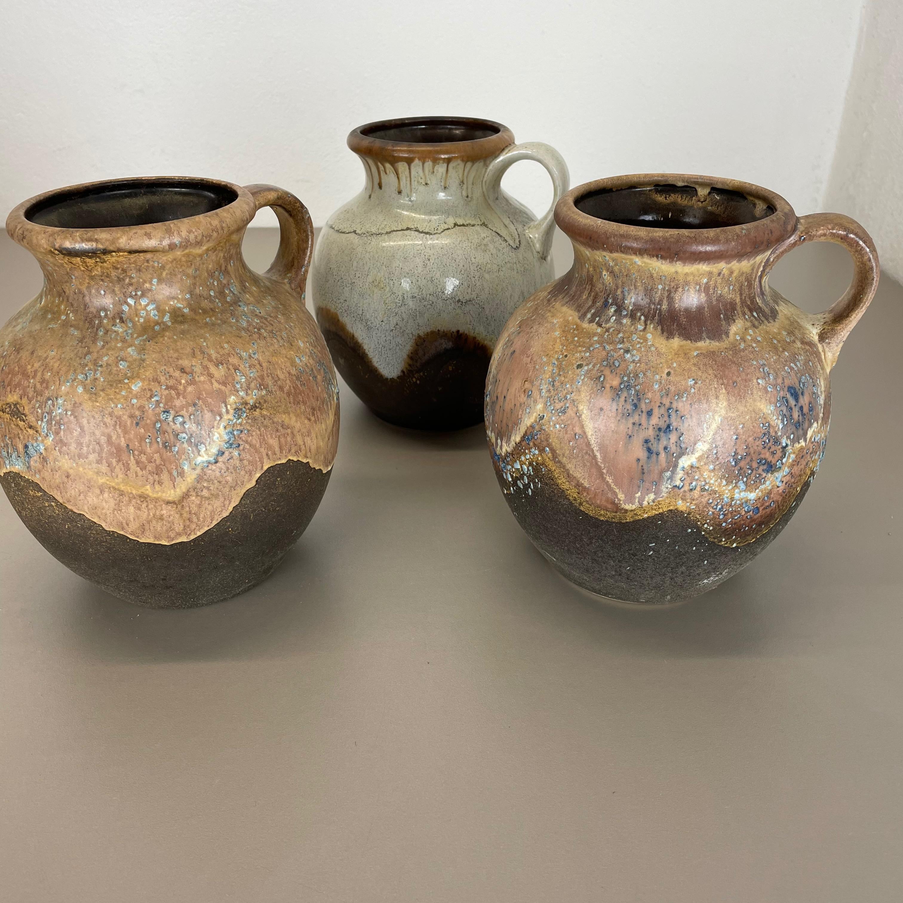 Set di 3 rari vasi in ceramica 