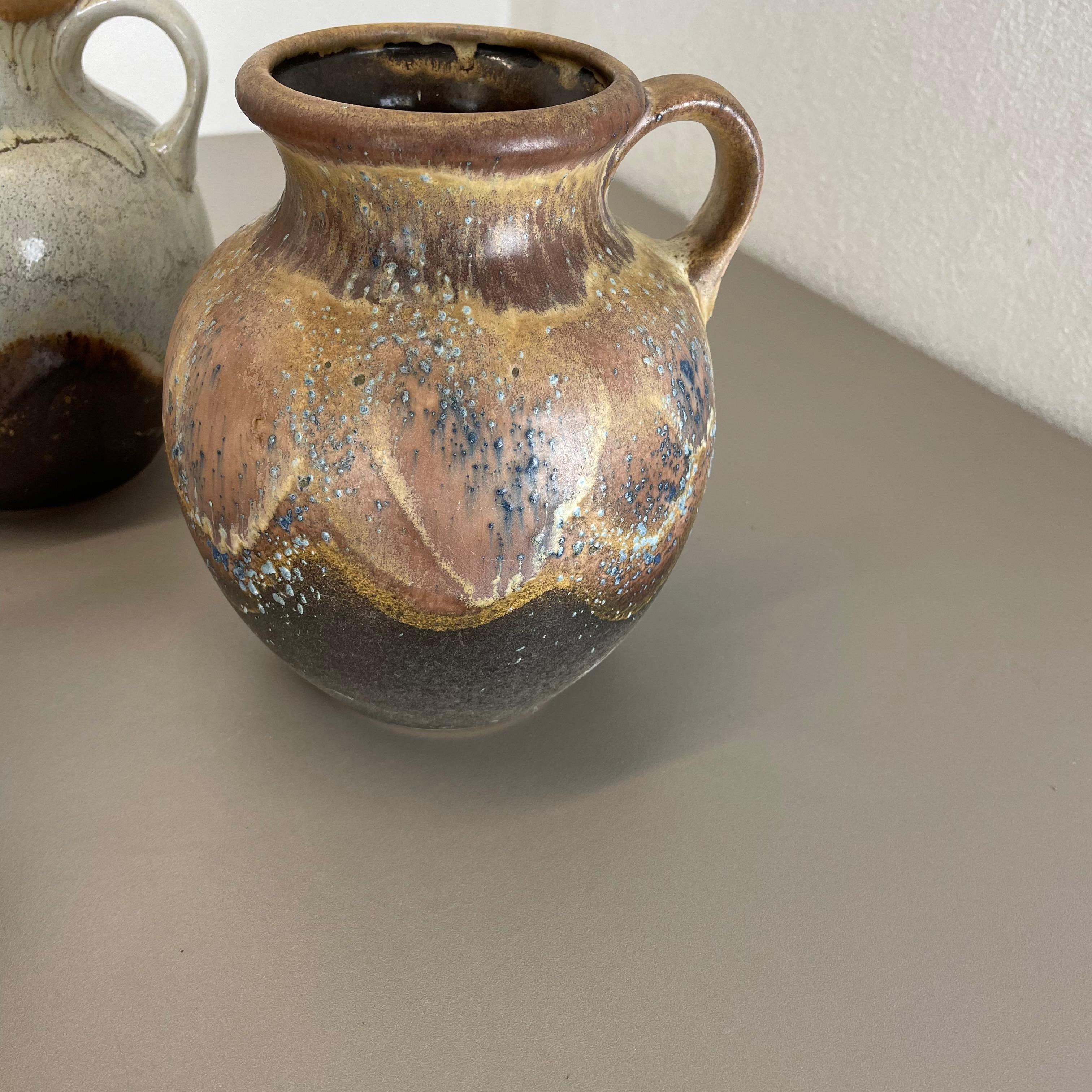 Set di 3 rari vasi in ceramica 
