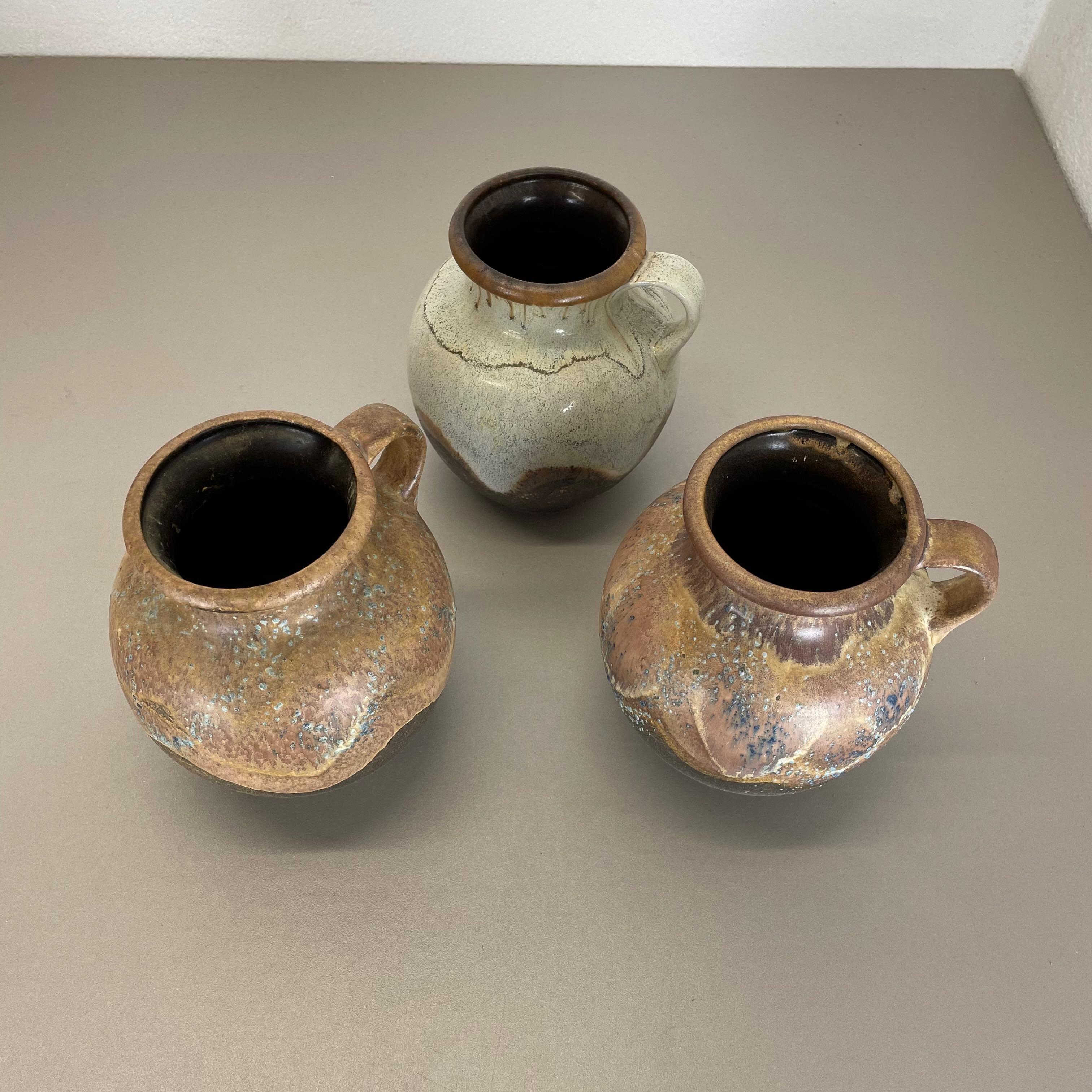 Set di 3 rari vasi in ceramica 