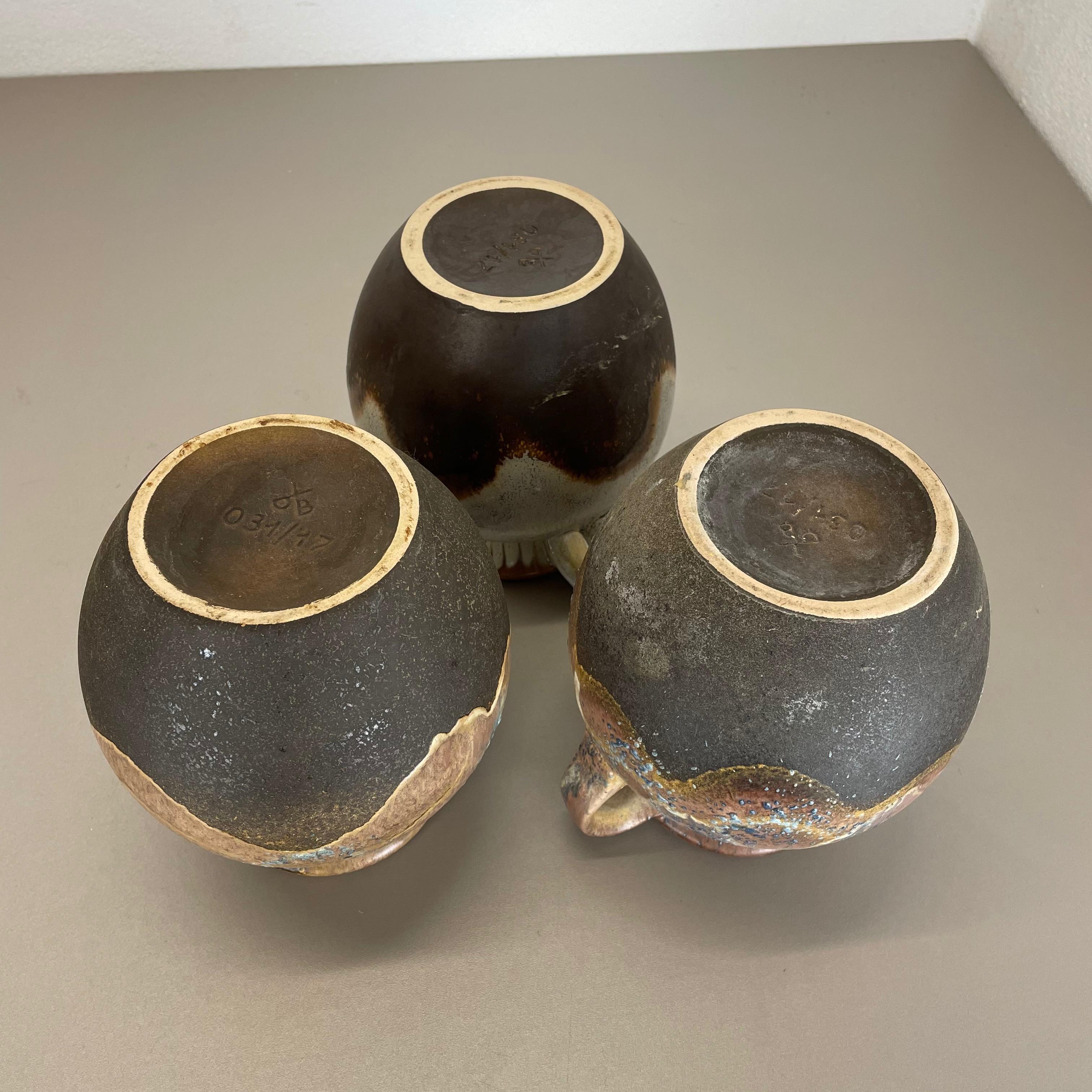 Set di 3 rari vasi in ceramica 