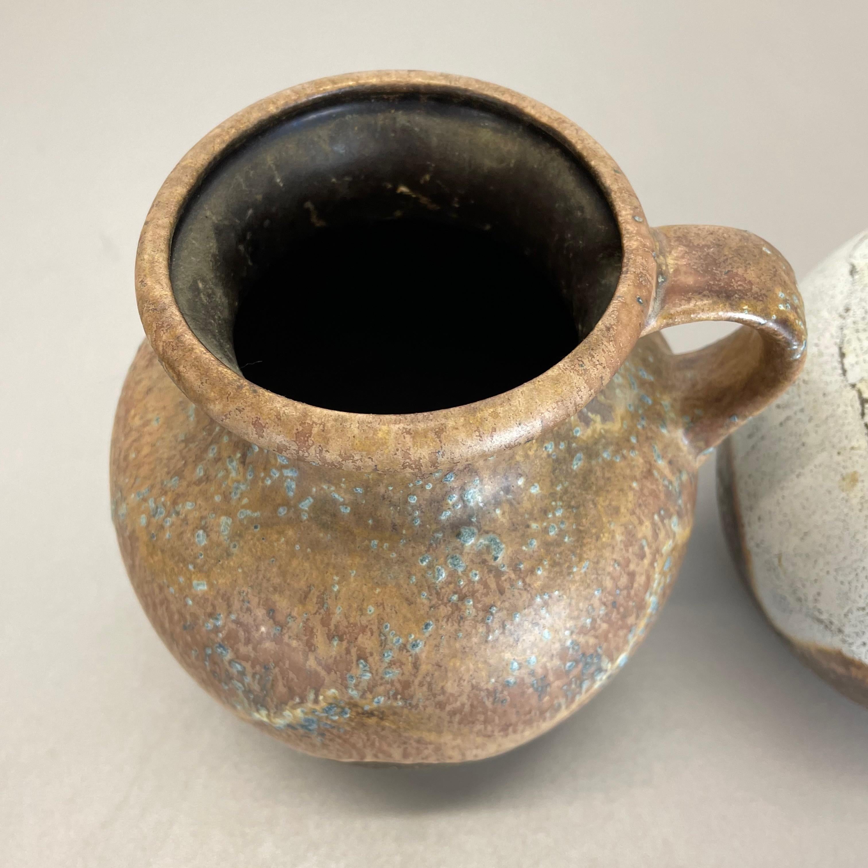 Set di 3 rari vasi in ceramica 