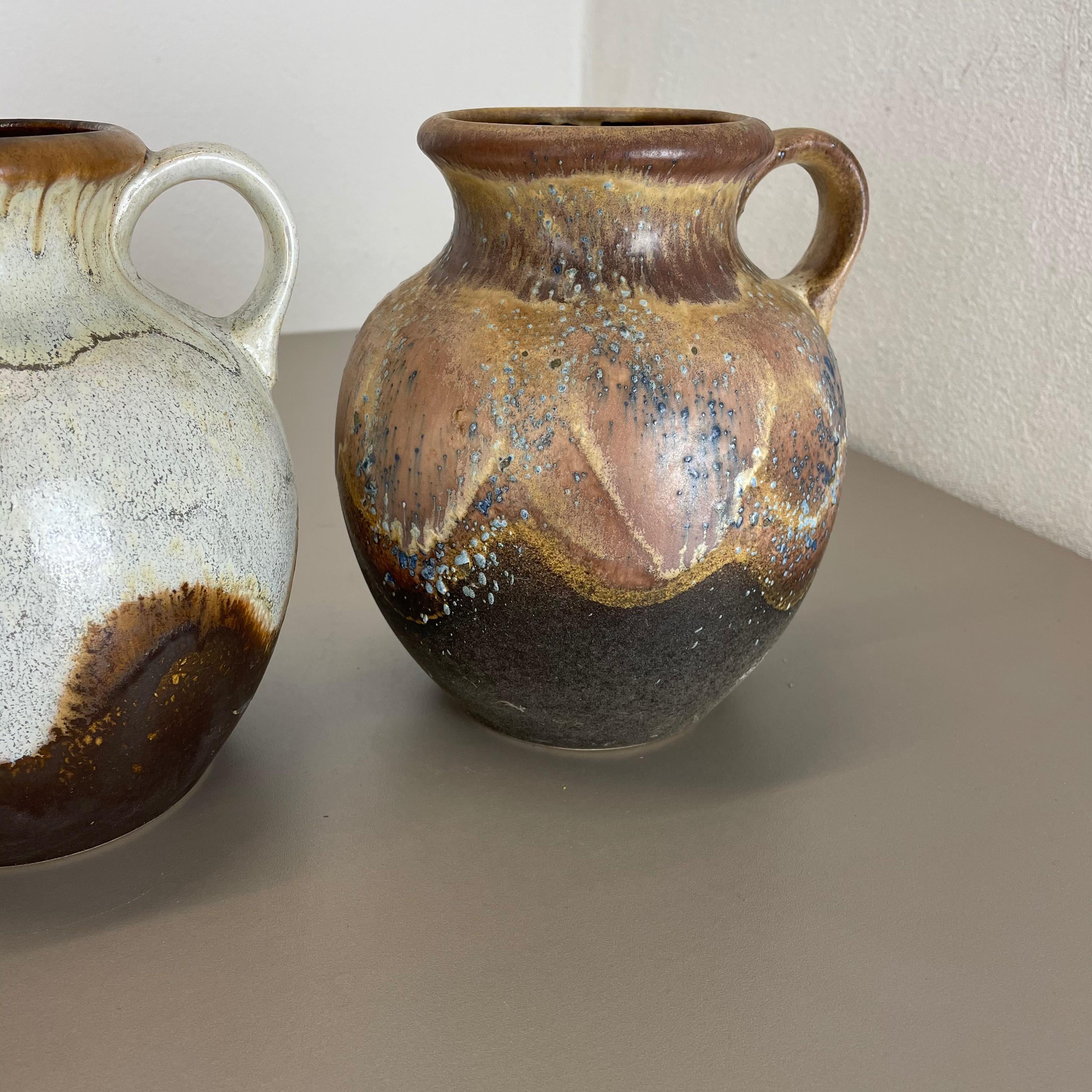 Set di 3 rari vasi in ceramica 