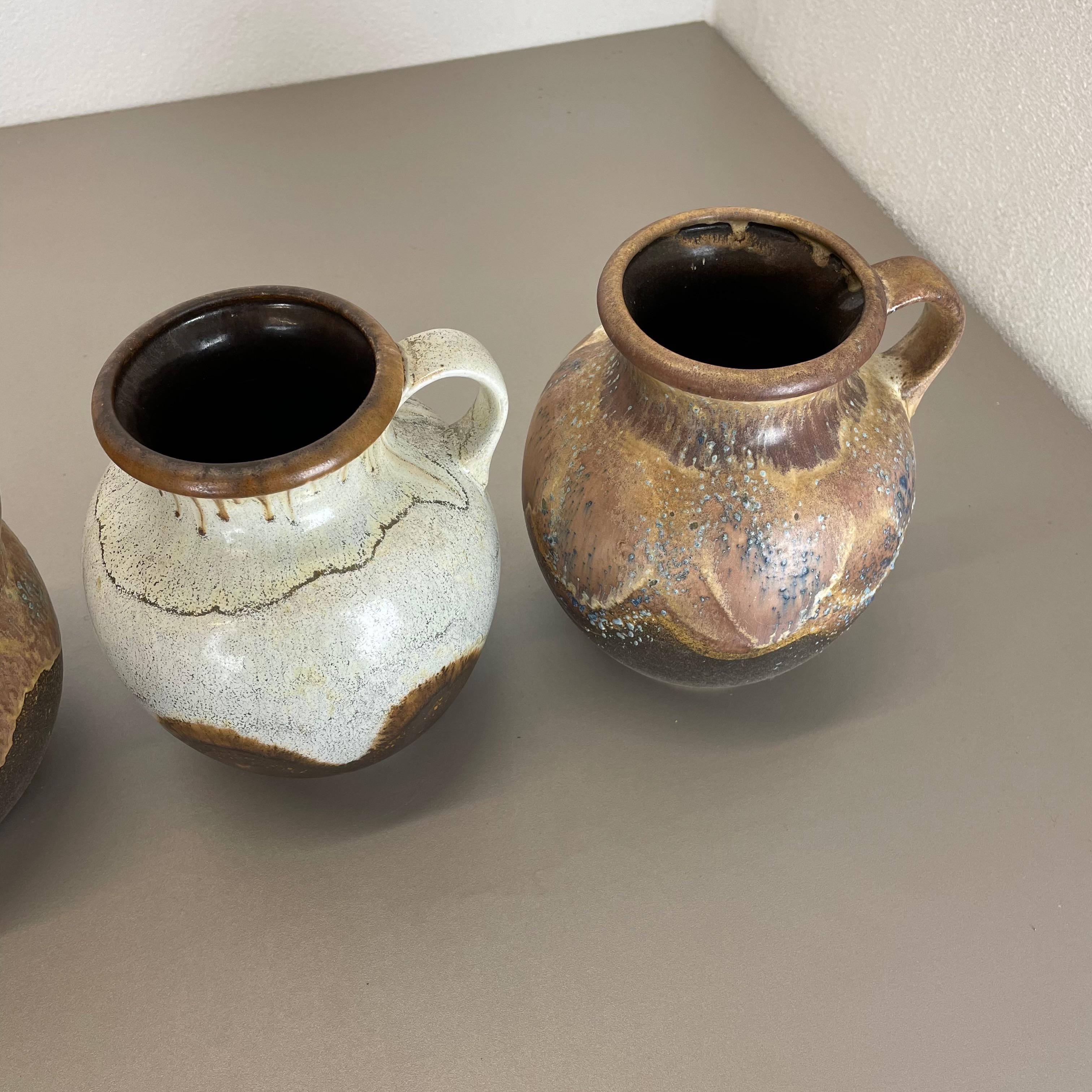 Set di 3 rari vasi in ceramica 
