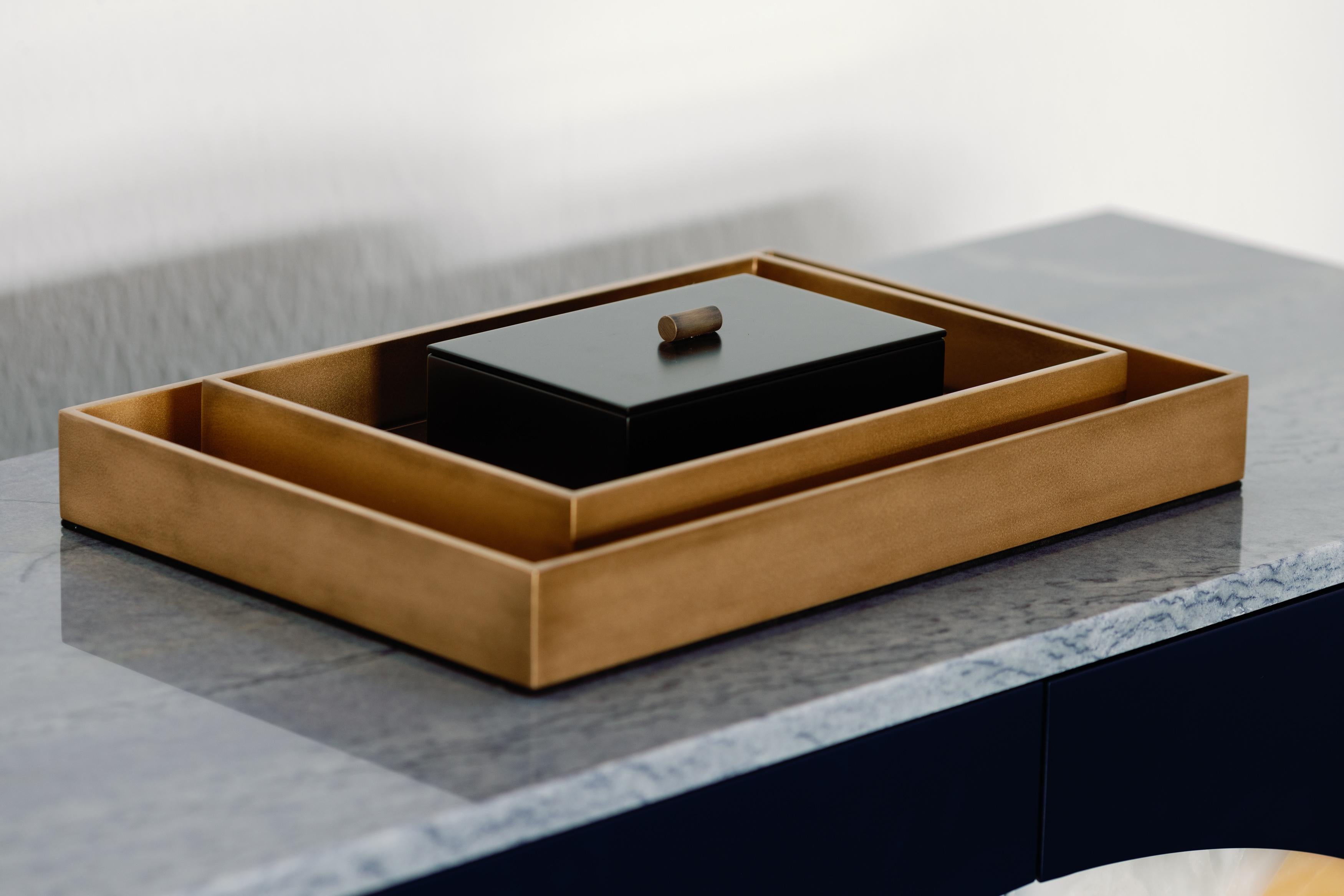 Set of 2 Piemonte trays and box aga, Lusitanus Home Collection, Handcrafted in Portugal - Europe by Lusitanus Home.

A sublime serving tray, Piemonte was design to uplift layback moments. A wooden serving tray lined in dark oxidized gold with bronze