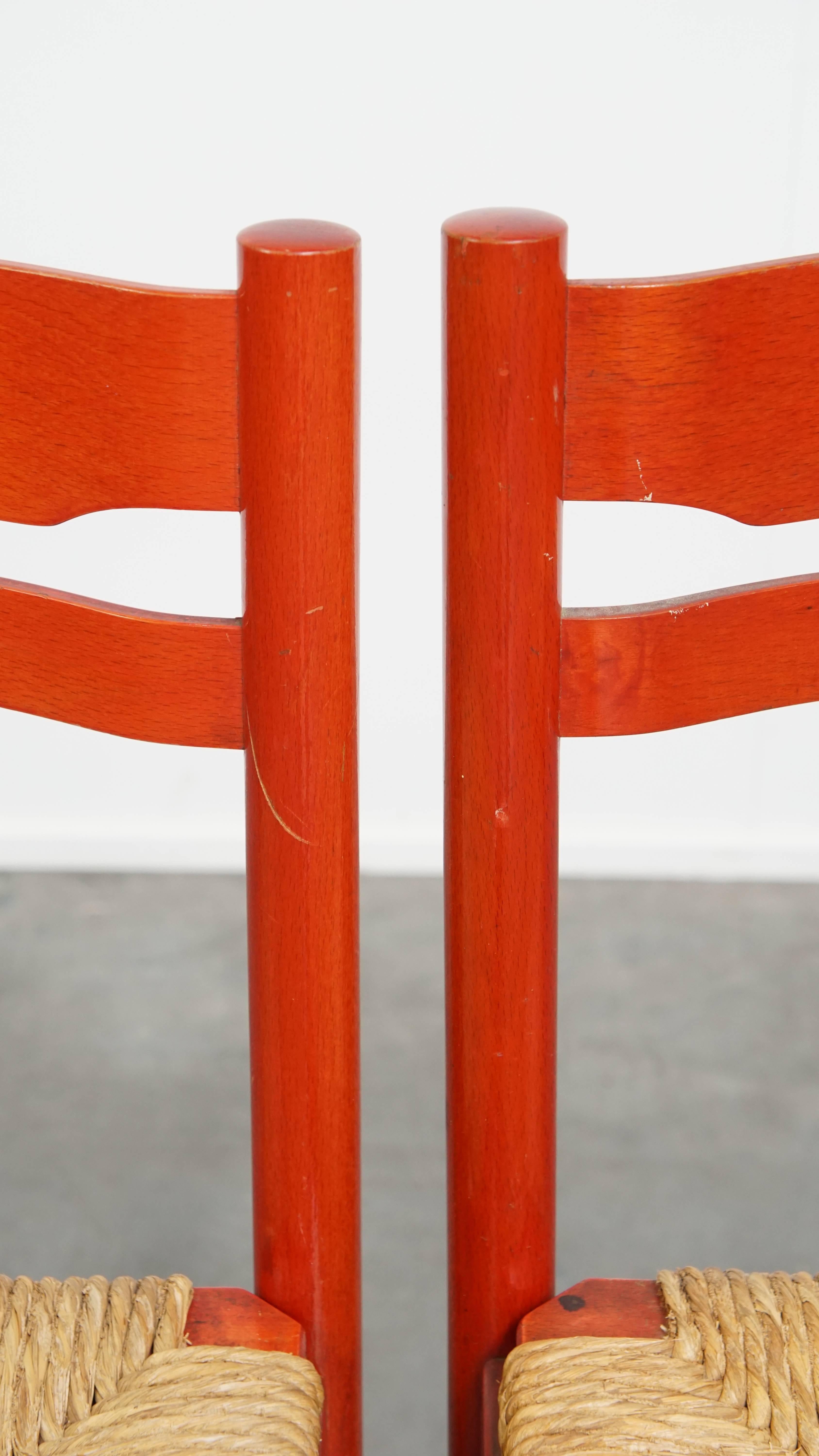 Set of 3 red vintage wooden chairs from the 1970s with a woven wicker seat For Sale 5