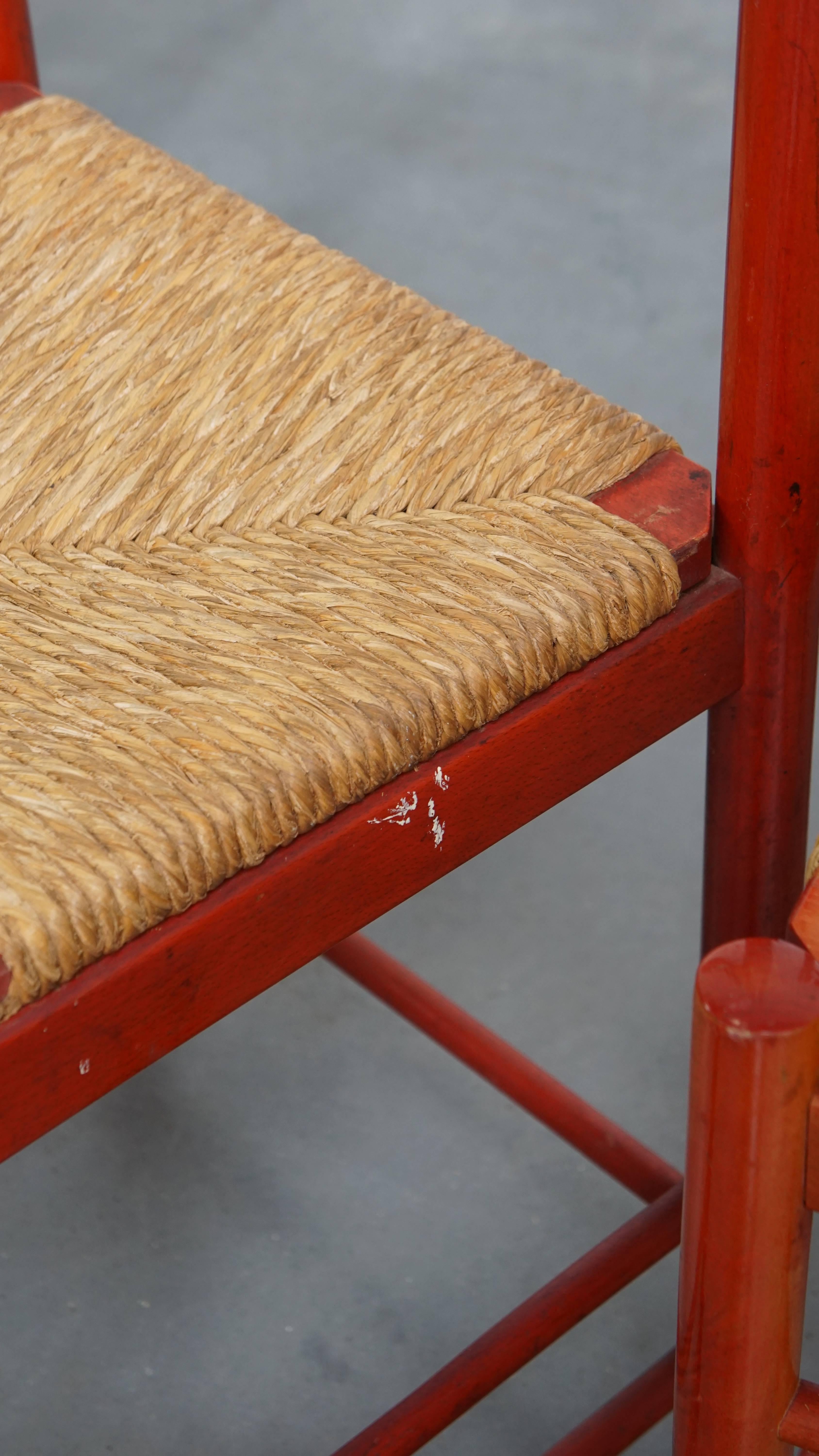 Set of 3 red vintage wooden chairs from the 1970s with a woven wicker seat For Sale 8