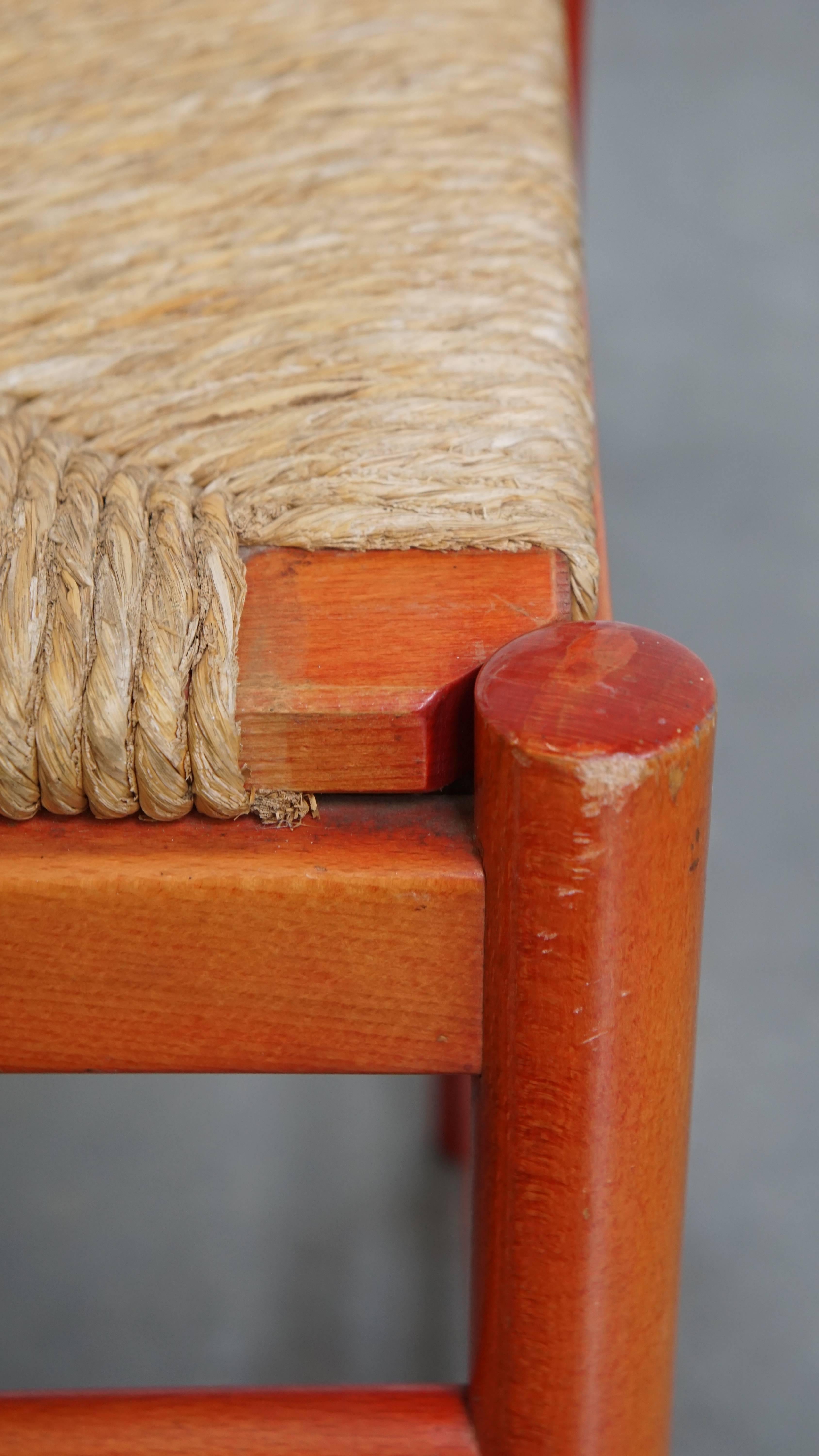 Set of 3 red vintage wooden chairs from the 1970s with a woven wicker seat For Sale 9