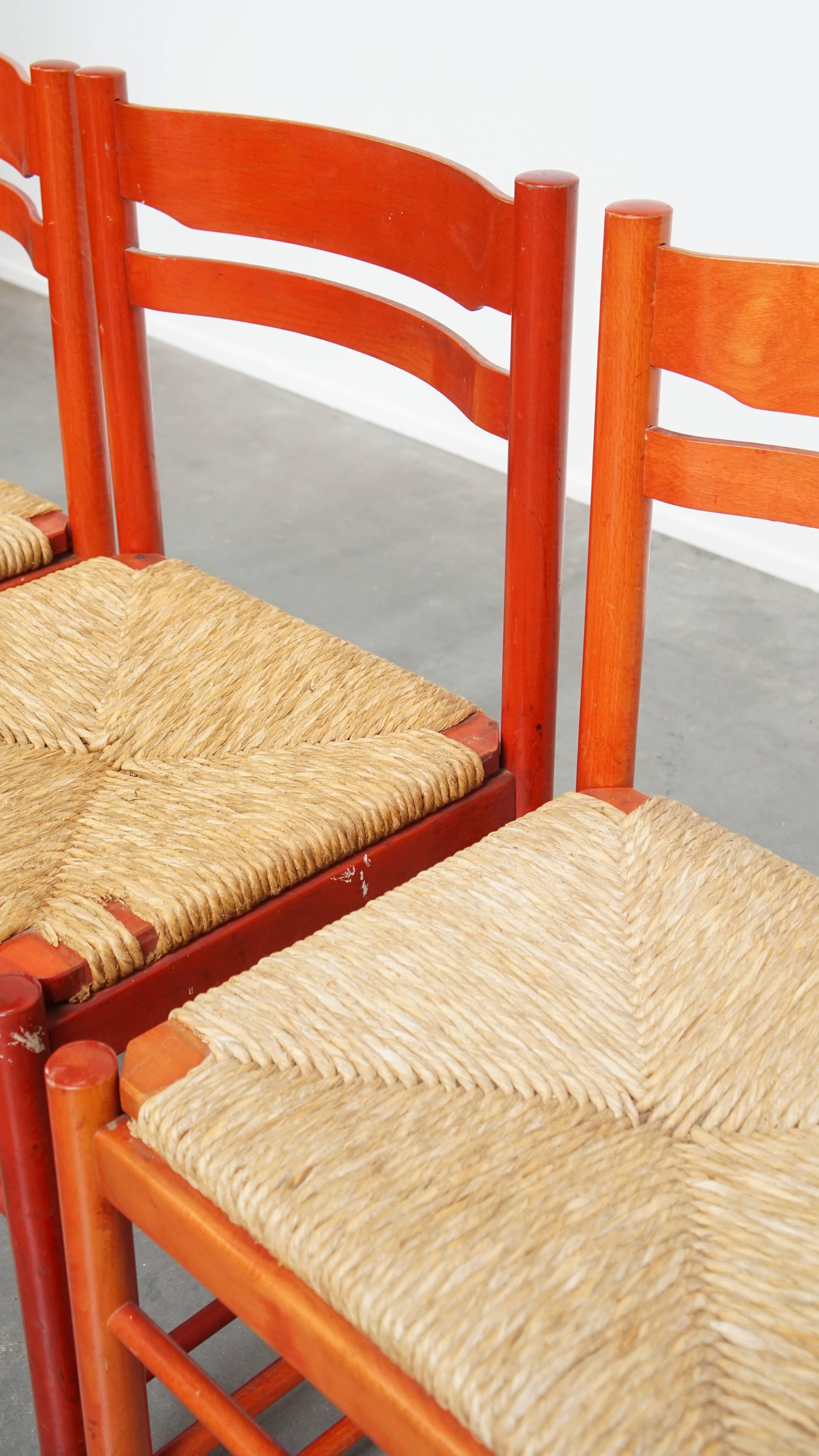 Set of 3 red vintage wooden chairs from the 1970s with a woven wicker seat For Sale 3