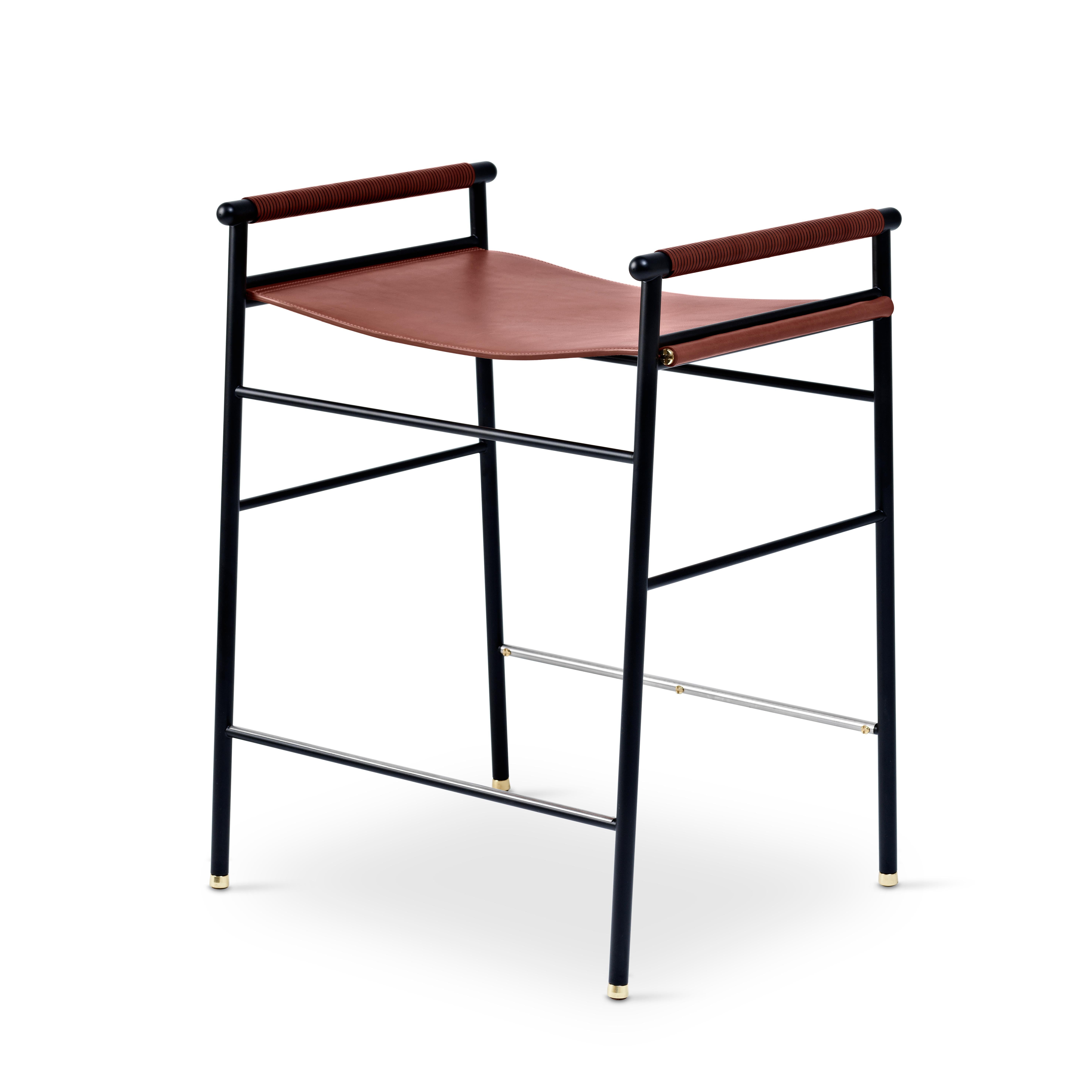 The “Repose” contemporary counter stool belongs to a collection that revisit the director chair collection, serene pieces where exclusivity and precision are shown in small details such as the hand-turned metal nuts and bolts that fix the leather