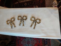 Set of 3 Ribbon Backed Early 20thC Brass Wall Hooks