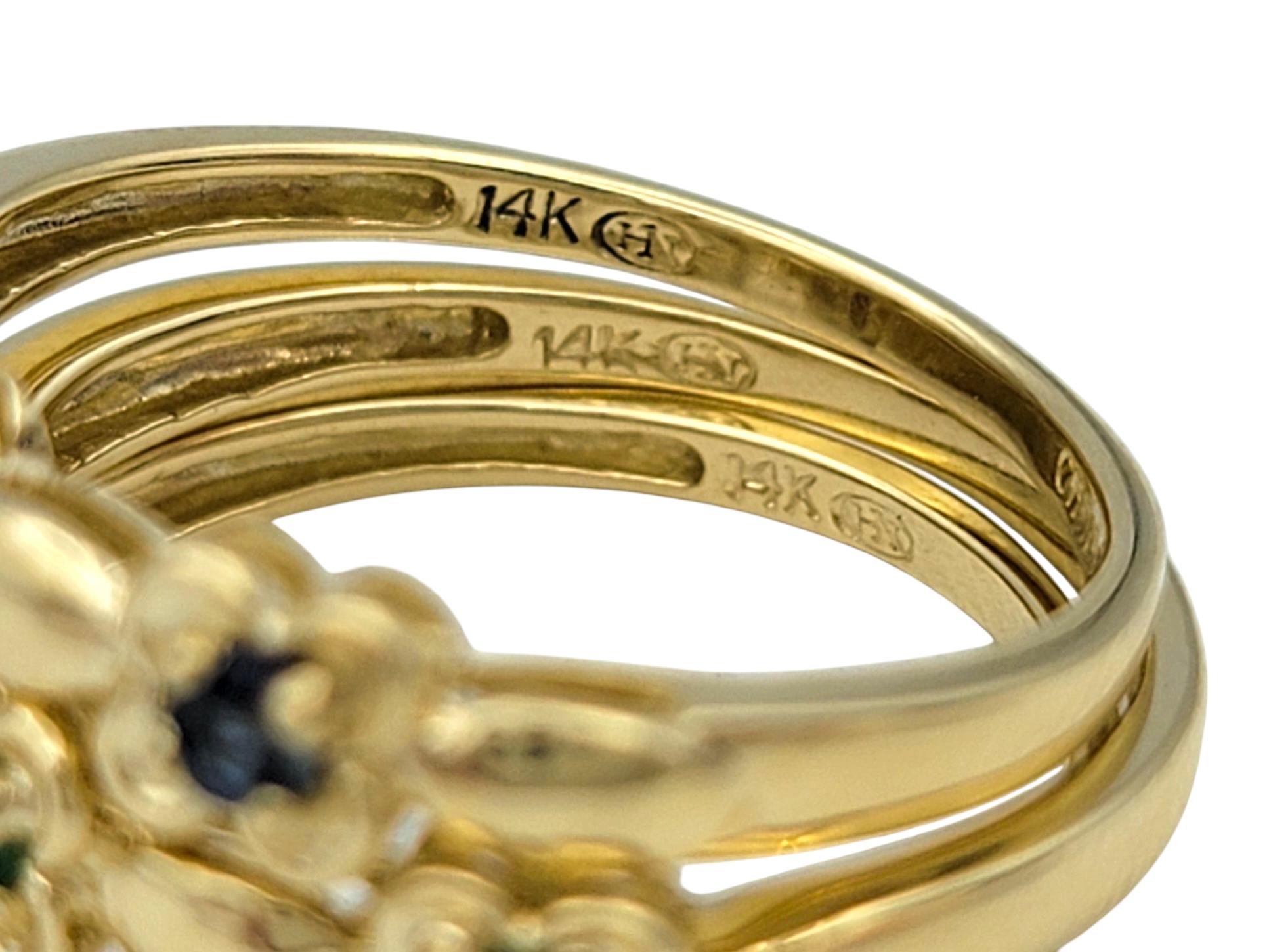 Set von 3 Saphir-, Smaragd- und Rubin-Blumen-Stapelringen aus 14 Karat Gelbgold im Angebot 1
