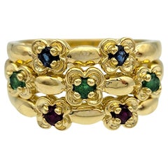 Set von 3 Saphir-, Smaragd- und Rubin-Blumen-Stapelringen aus 14 Karat Gelbgold