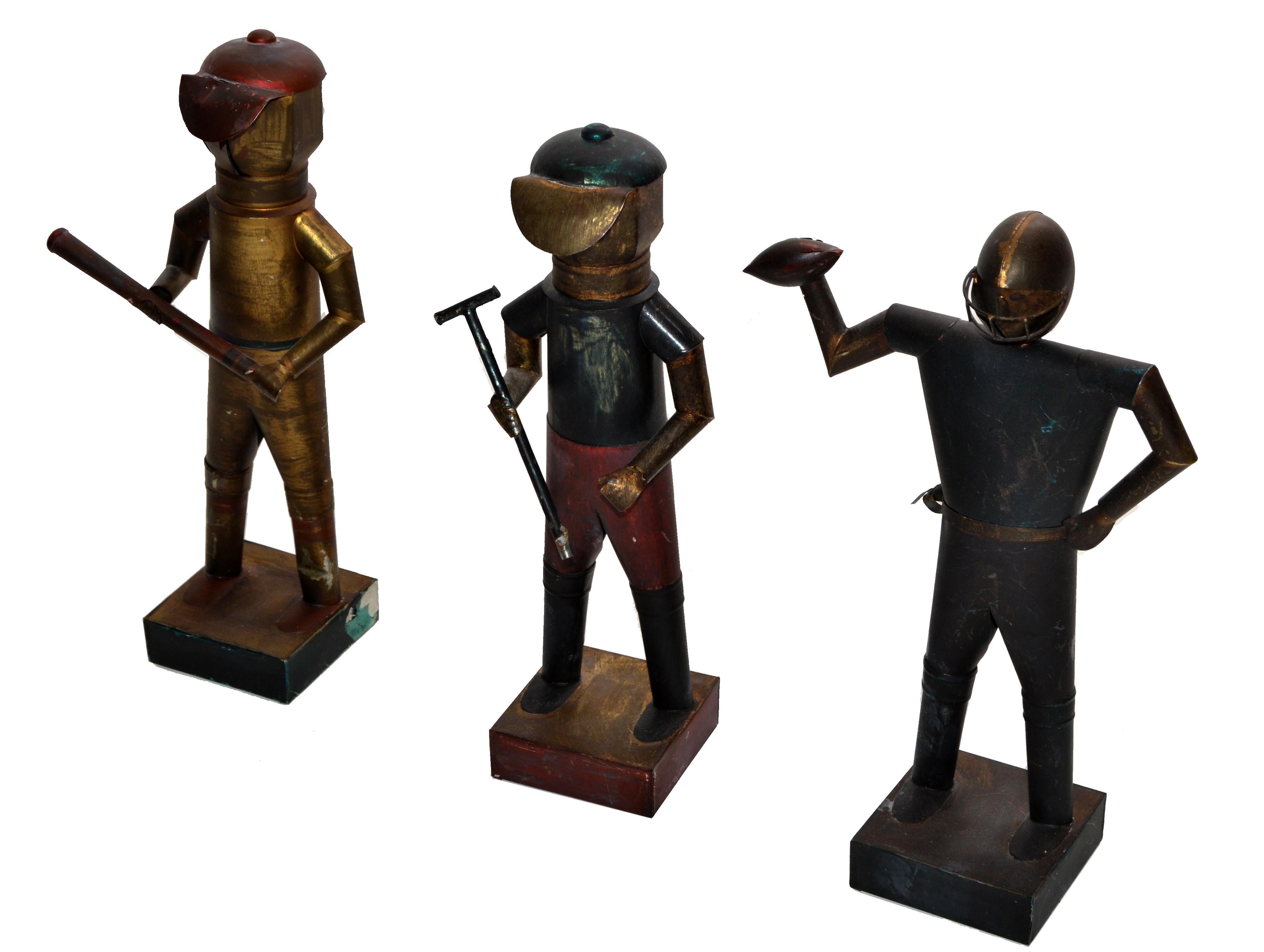 Sarreid Ltd. Mexico handcrafted Mid-Century Modern tin metal sports player figurine, set of 3.
Marked and numbered at the base.
Rare Collector's Items.