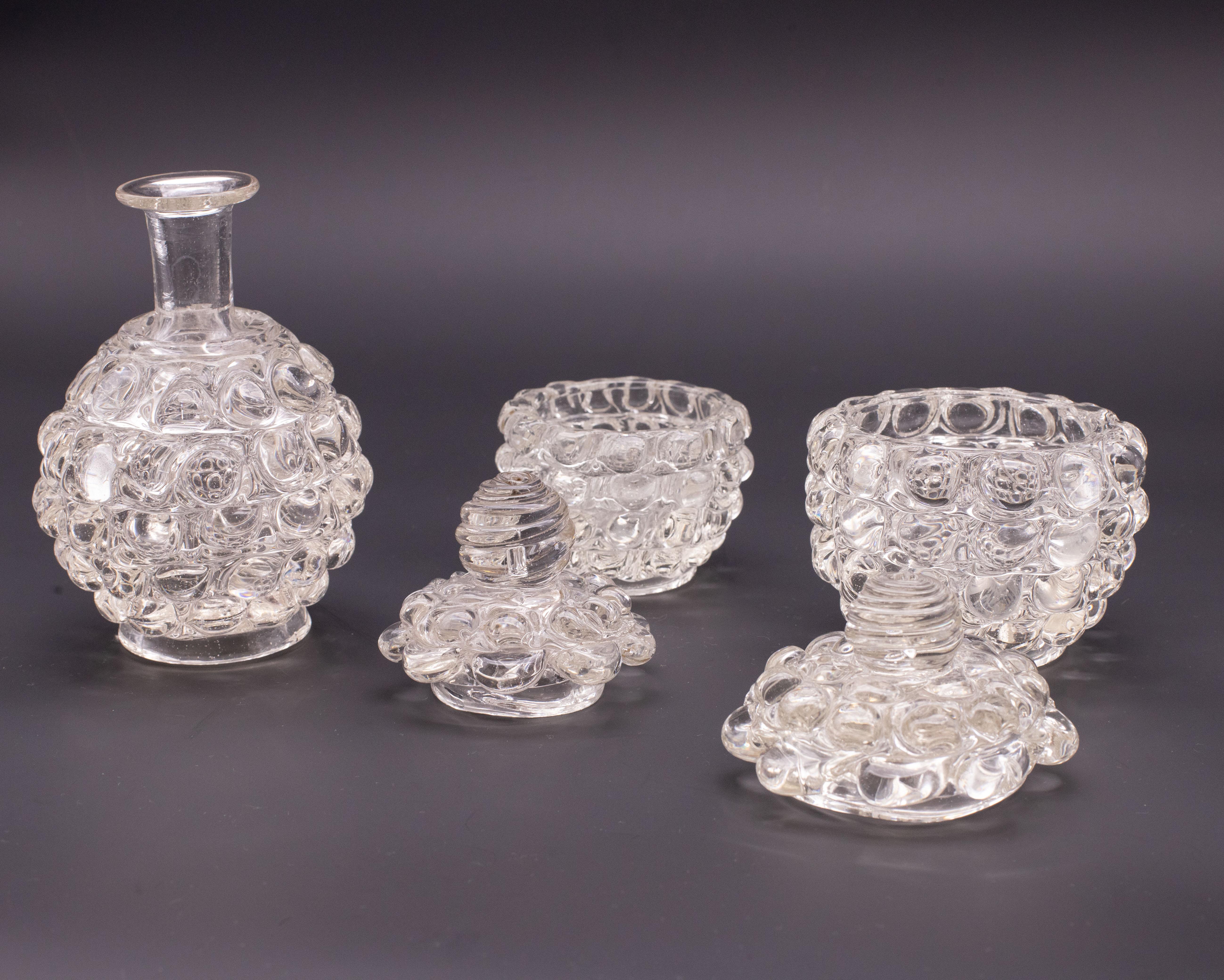 Extraordinary and unique rare set of 3 lens series vase by Barovier and Toso glassworks, period 1940.

Small pitcher
h 12 centimeters
D 8 centimeters
Pitcher large
h 13
D 10
Vase 
h 15
D 14

Excellent vintage condition.
