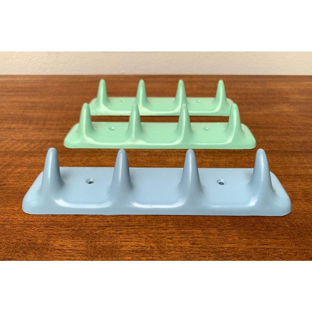 Sesia Hook Bar Warderobe or Towel Holder from CM Brevettato, Italy, 1960s, Set of 3, in Very Good conditions. Designed 1960 to 1969 This piece has an attribution mark.

Additional information:
Materials: Plastic
Color: Blue
Styles: Mid-Century