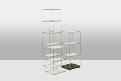 Set of 3 shelves in chrome-plated metal and glass. 1970s