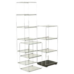 Set of 3 shelves in chrome-plated metal and glass. 1970s
