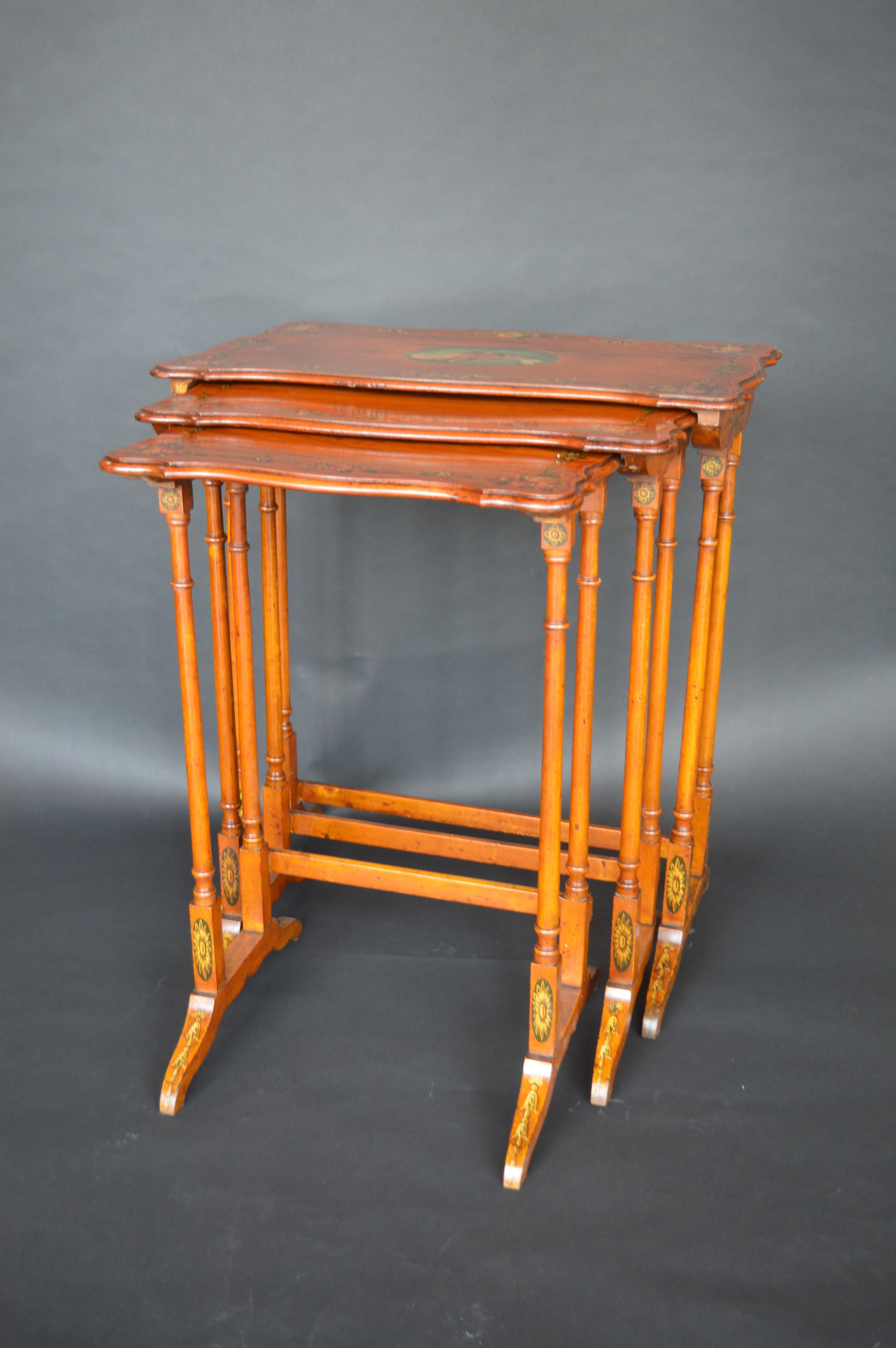 3 Sheraton revival satin wood nesting tables with hand painted cherubs and rose detail on the frame.