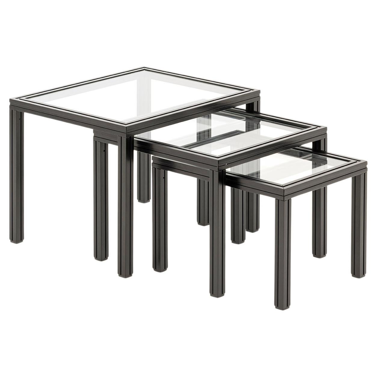 Conjunto de 3 mesas auxiliares de metal negro y cristal en venta