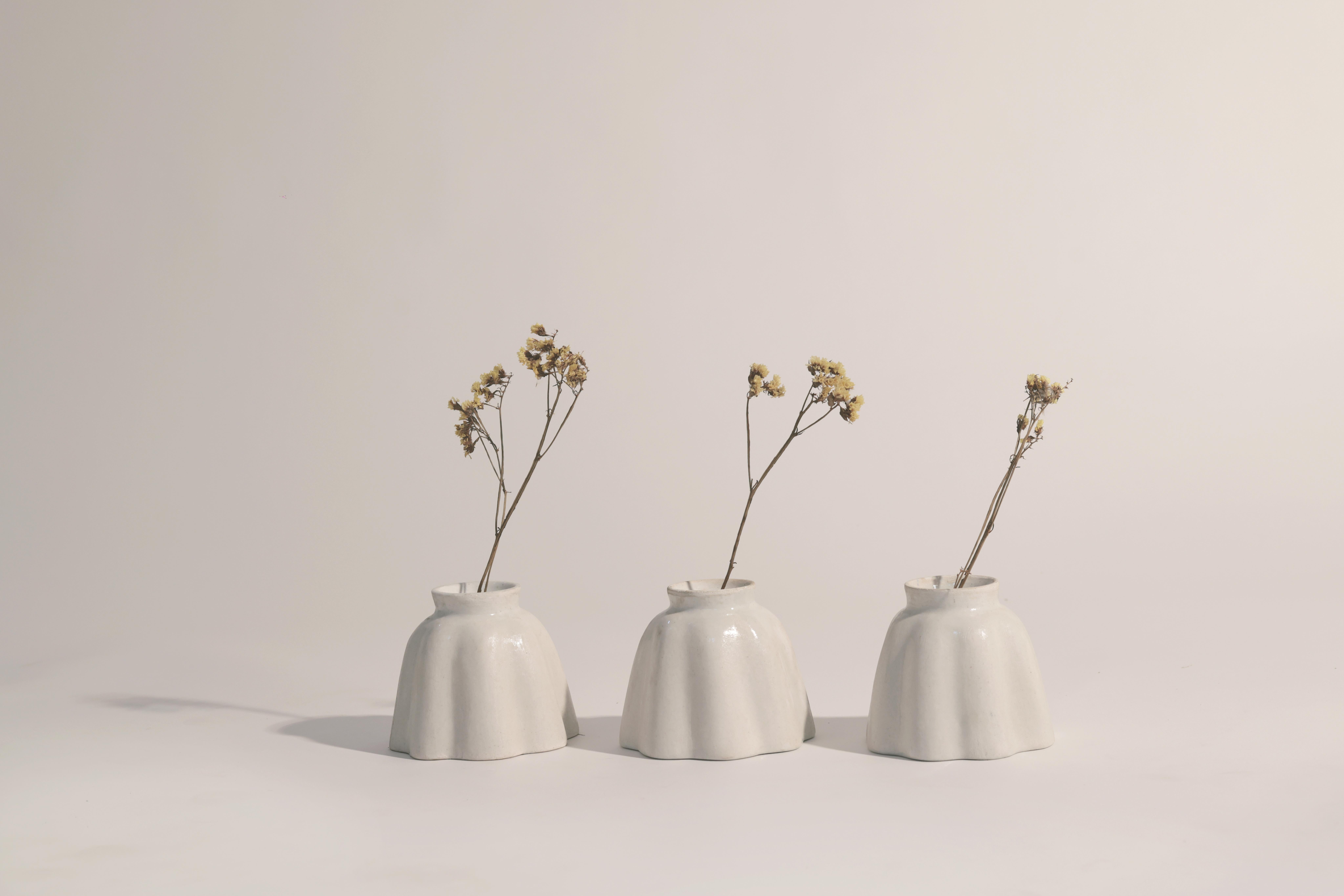 Set Of 3 Skirts Swarm Vases by Newblue
Unique Pieces
Dimensions: D 14 x W 12 x H 14 cm.
Materials: Patent-pending Newblue recycled ceramic material, recycled sanitary ware, recycled glass, quartz, and plant-based binders.

All ceramic furniture and