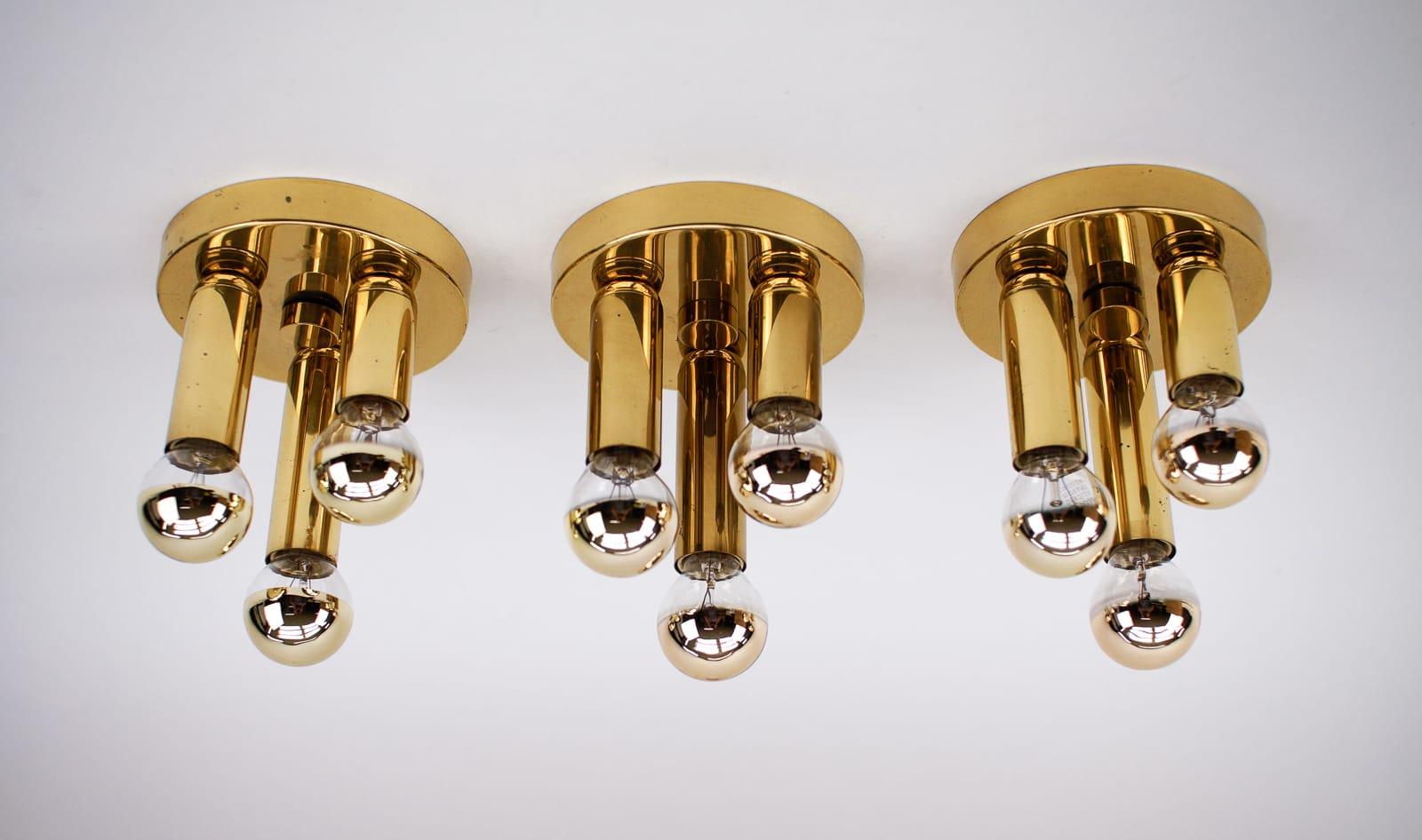 Set of three rare and beautiful Mid-Century Modern wall lamps. 

Fully functional.

Each with three E14 sockets. Works with 220V and 110V.

Wiring is suitable for all countries.

Very good original vintage condition. Wear consistent with use