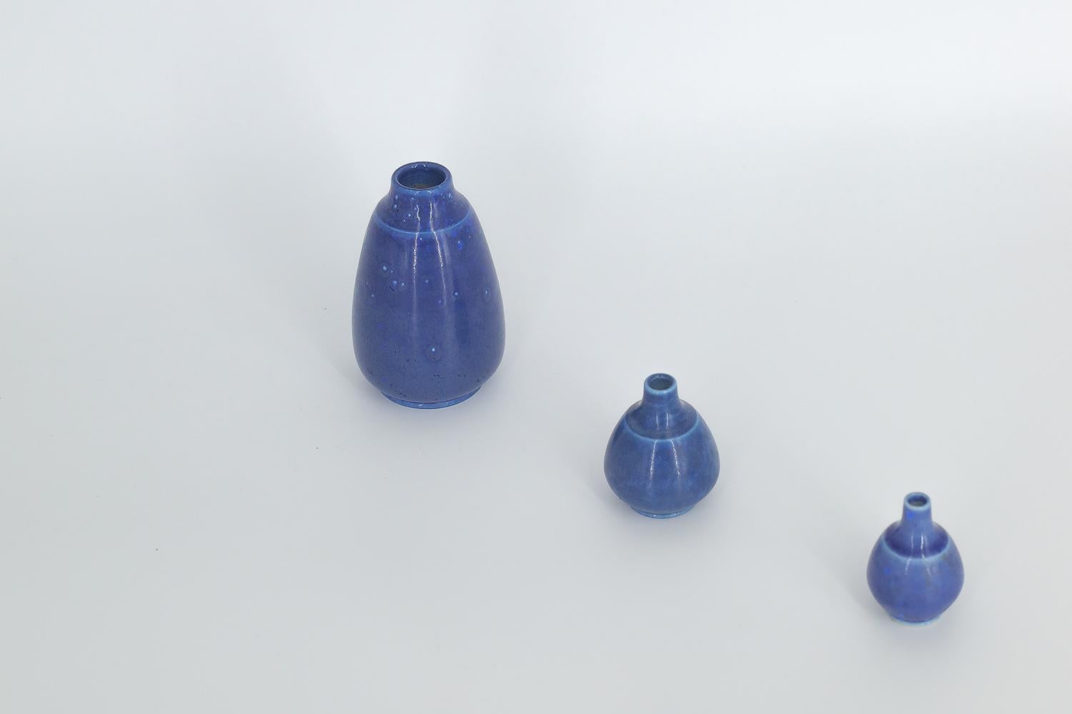 1. Height 9 cm | Width 5 cm | Depth 5 cm
2. Height 5 cm | Width 4 cm | Depth 4 cm
3. Height 4.5 cm | Width 3 cm | Depth 3 cm

This set of 3 miniature vases was designed by Gunnar Borg for the Swedish manufacture Gunnars Keramik Höganäs during the