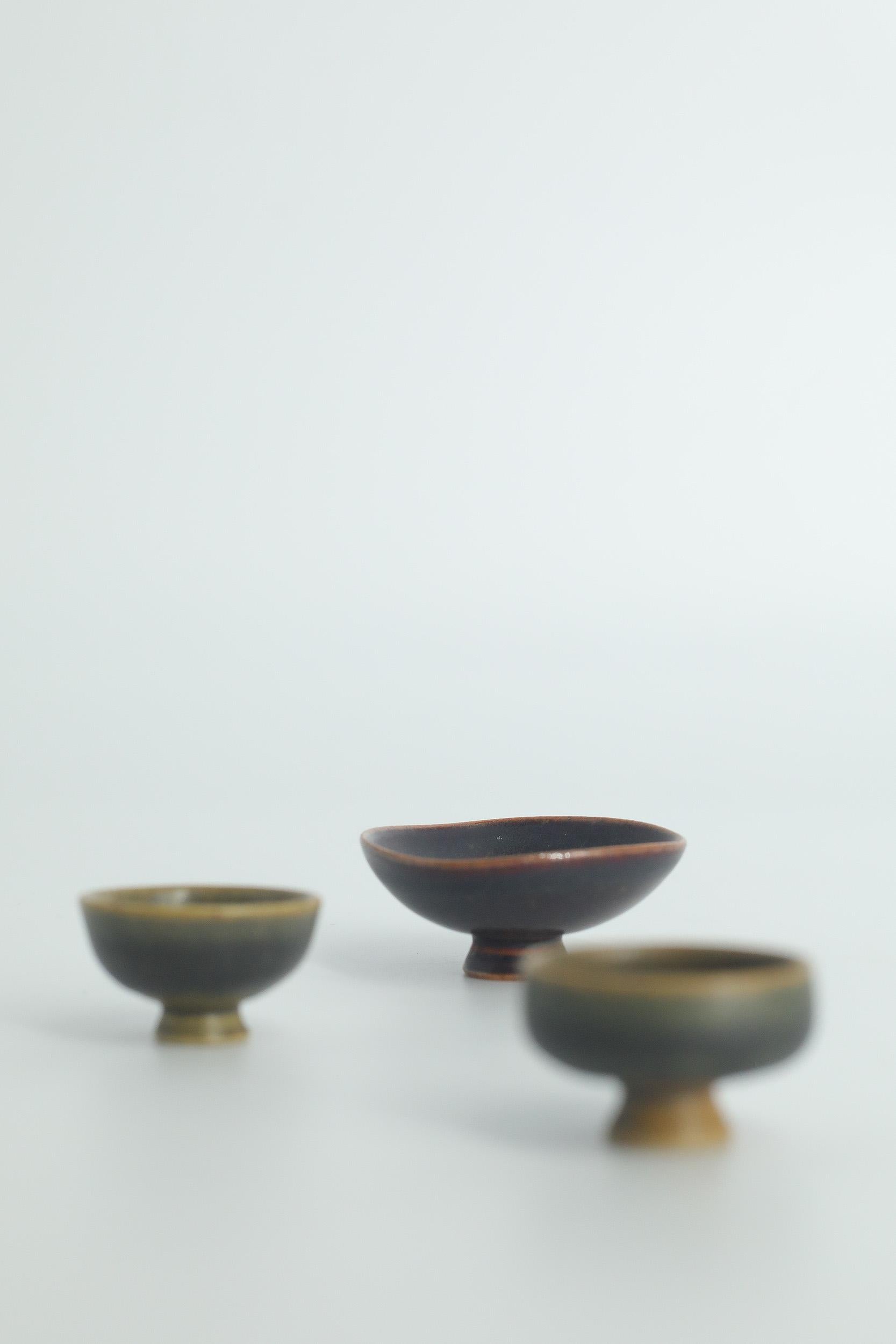 Height 2 cm  Width 4 cm  Depth 4 cm
Height 2 cm  Width 2.5 cm  Depth 2.5 cm
Height 2 cm  Width 2.5 cm  Depth 2.5 cm

This set of 3 miniature bowls was designed by John Andersson for the Swedish manufacture Höganäs Keramik during the 1950s. Handmade