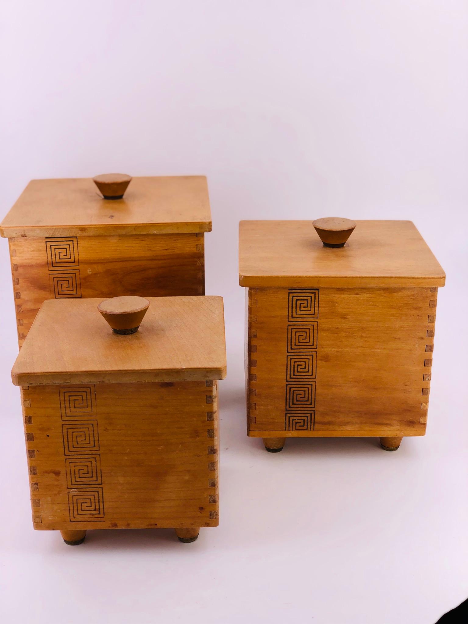 Nice set of 3 solid wood vintage boxes, handmade in Japan 1959 by Woodpecker woodware, dovetail and cool small feet with brass tips, perfect for the kitchen. Nice design on front. in 3 sizes.