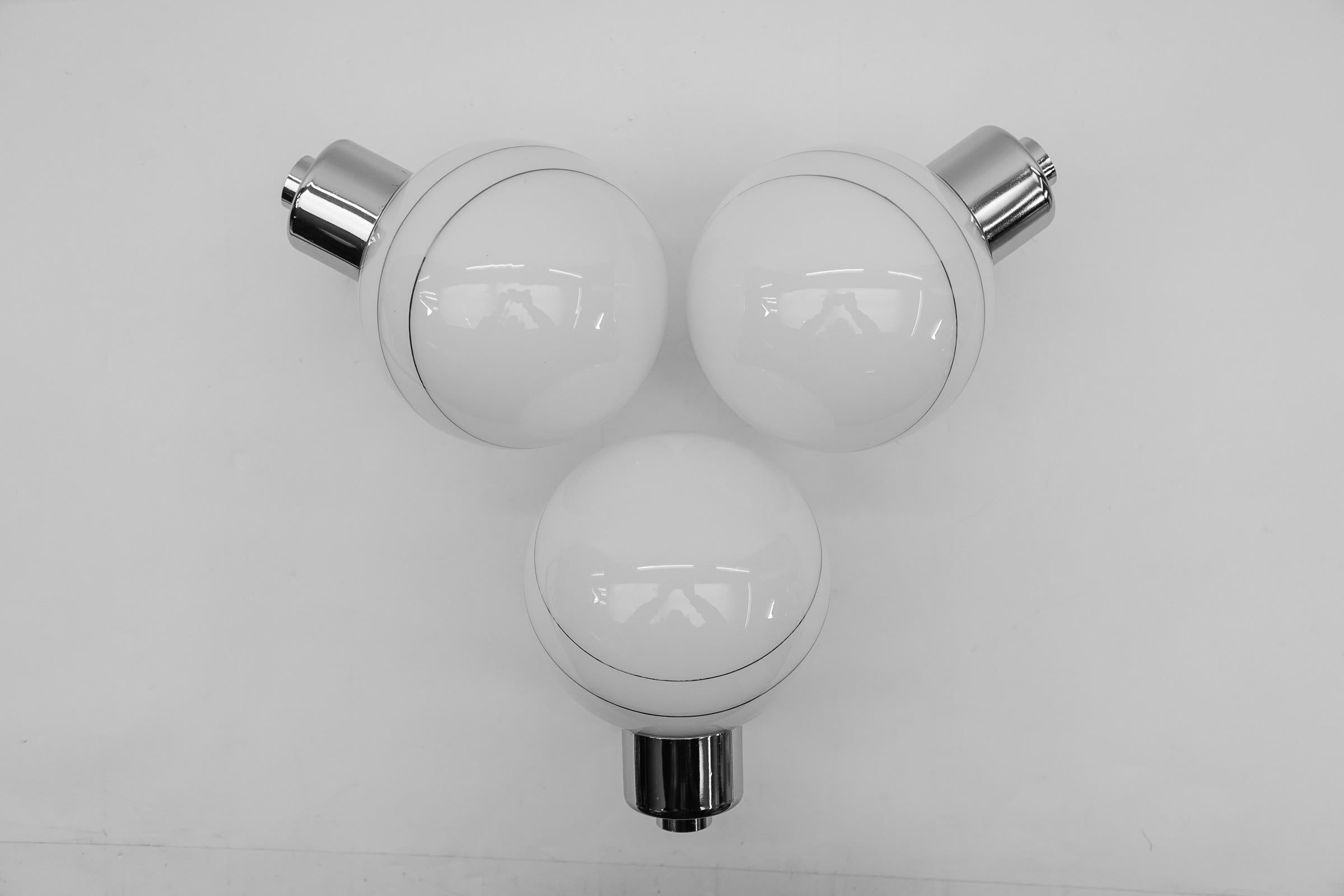 Mid-Century Modern Set of 3 Space Age Chrome Wall Lamps with Milk Glass Ball Shades, 1970s For Sale