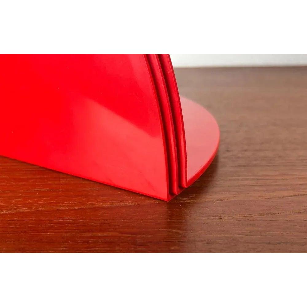 Mid-Century Italian Space Age Model 4909 Bookends by Giotto Stoppino for Kartell, 1960s, Set of 3, in Very Good conditions. Designed 1960 to 1969 This piece has an attribution mark.

Additional information:
Materials: Plastic
Color: Red
Styles: