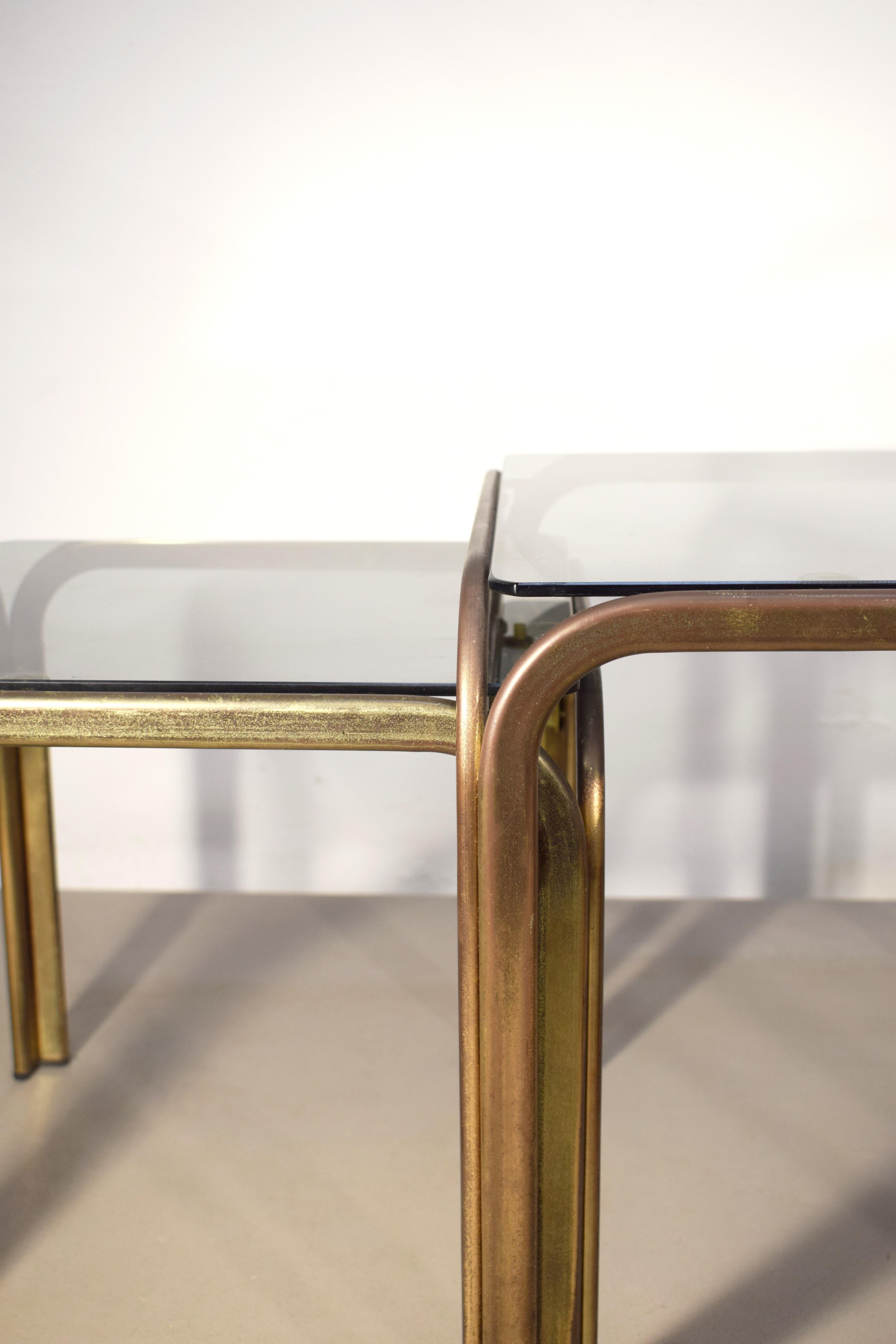 Set of 3 stackable coffee tables, brass and smoked glass, 1970s. For Sale 2