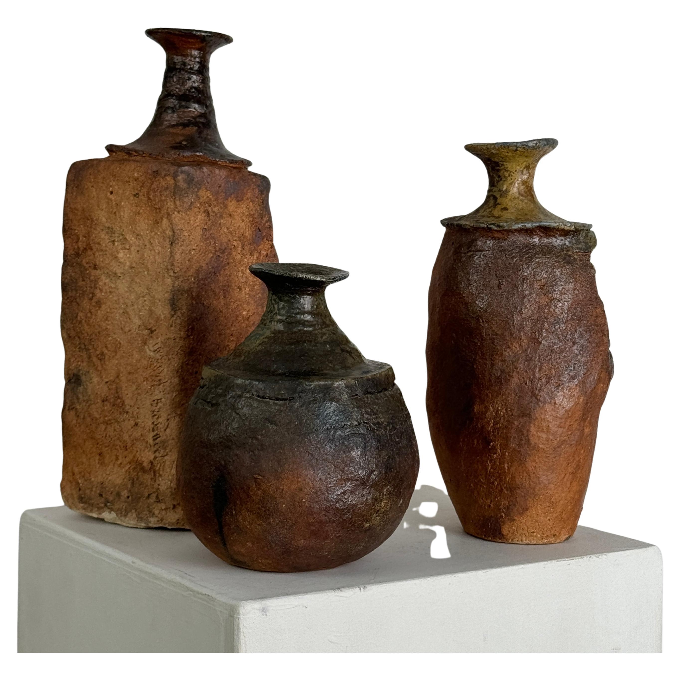 Set of 3 stoneware bottles by Gérard Brossard For Sale
