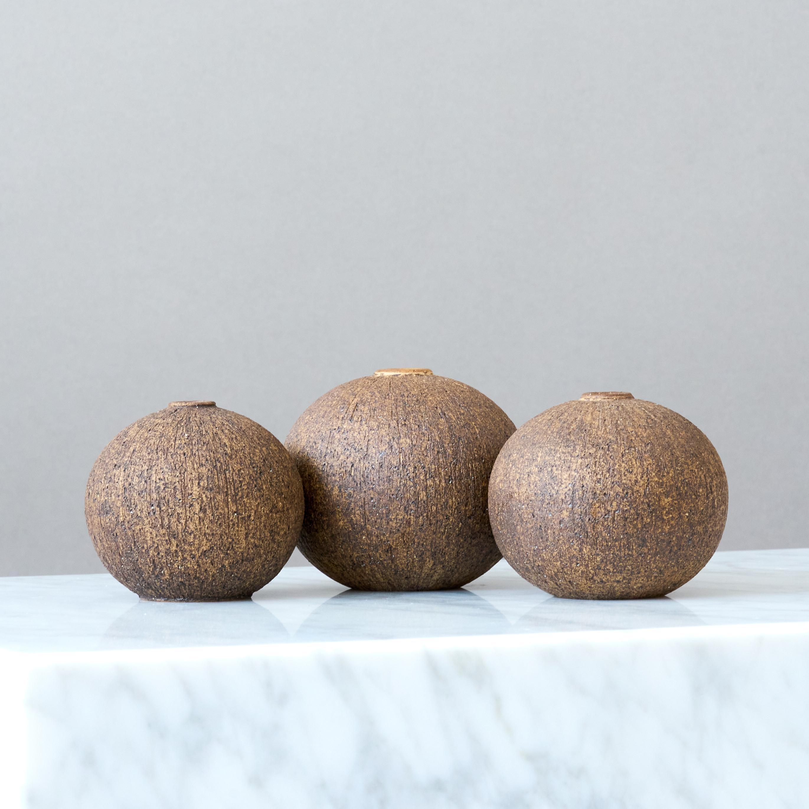 A set of three Mid-century beautiful stoneware globe vases. 
Made by Nils Allan Johannesson in his studio in Barsebäckshamn, Sweden, 1960s.

Great condition. No chips, cracks or crazing.
Impressed with makers mark.
