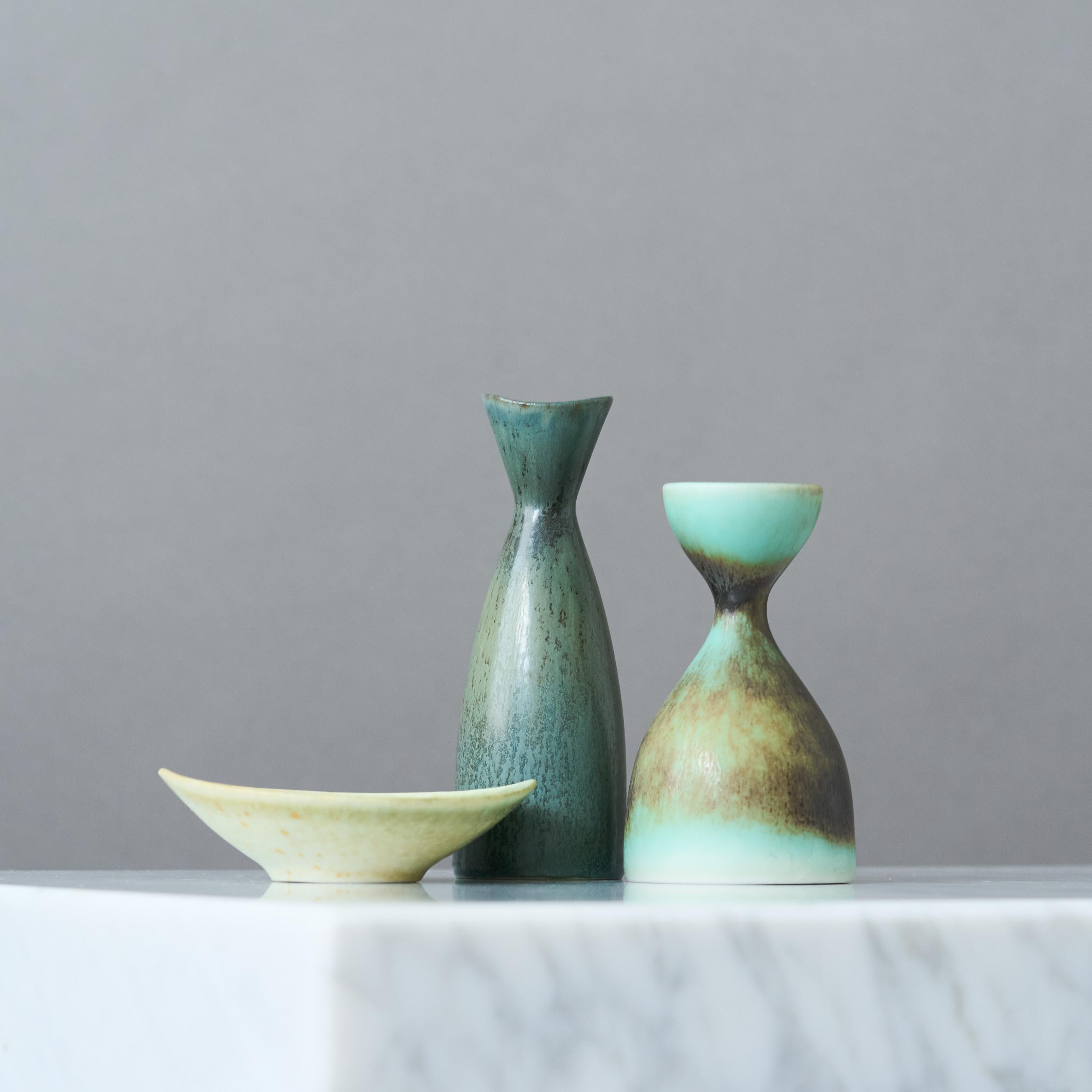A set of three beautiful green and blue stoneware miniatures with amazing glaze. 
Made by Carl Harry Stalhane for Rorstrand, Sweden, 1950s.

Great condition. 
Signed with 'CHS' and makers mark.

Carl-Harry Stålhane (1920-1990) is one of the most