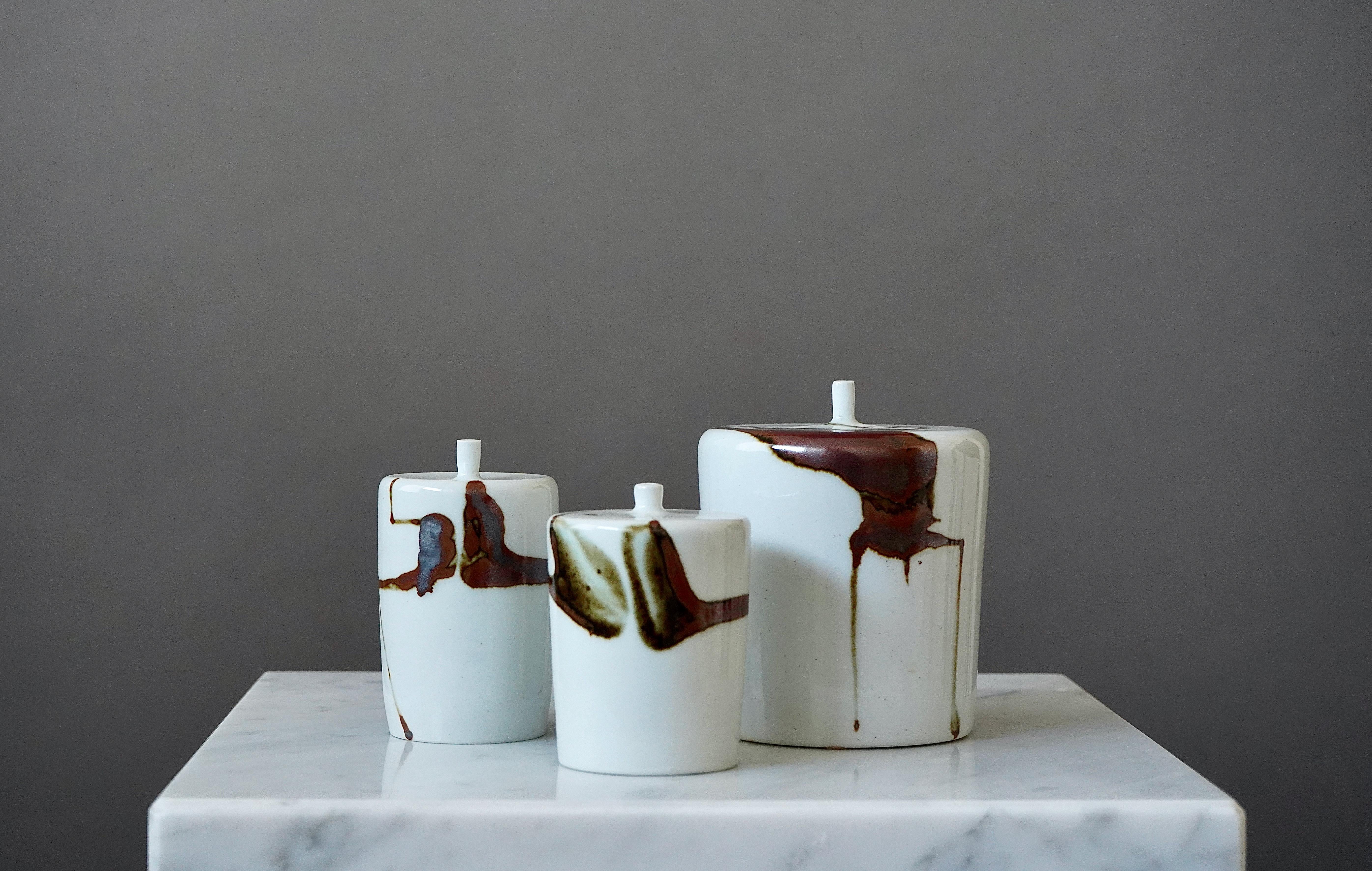 A set of beautiful stoneware vases with amazing glaze. 
Made by Claes Thell, in the Artist's studio, Höganäs, Sweden, 1991.

Excellent condition. Signed Thell '91.

Claes Thell is a Swedish ceramicist known for his intricate and sculptural